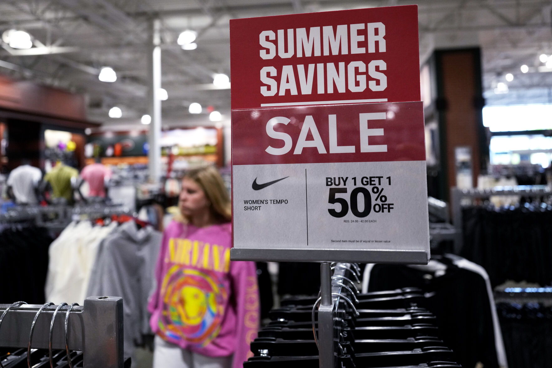 <p>A sale sign is displayed for clothes at a retail store in Vernon Hills, Ill., Monday, June 12, 2023. On Tuesday, the Labor Department reports on U.S. consumer prices for May. (AP Photo/Nam Y. Huh)</p>   PHOTO CREDIT: Nam Y. Huh  