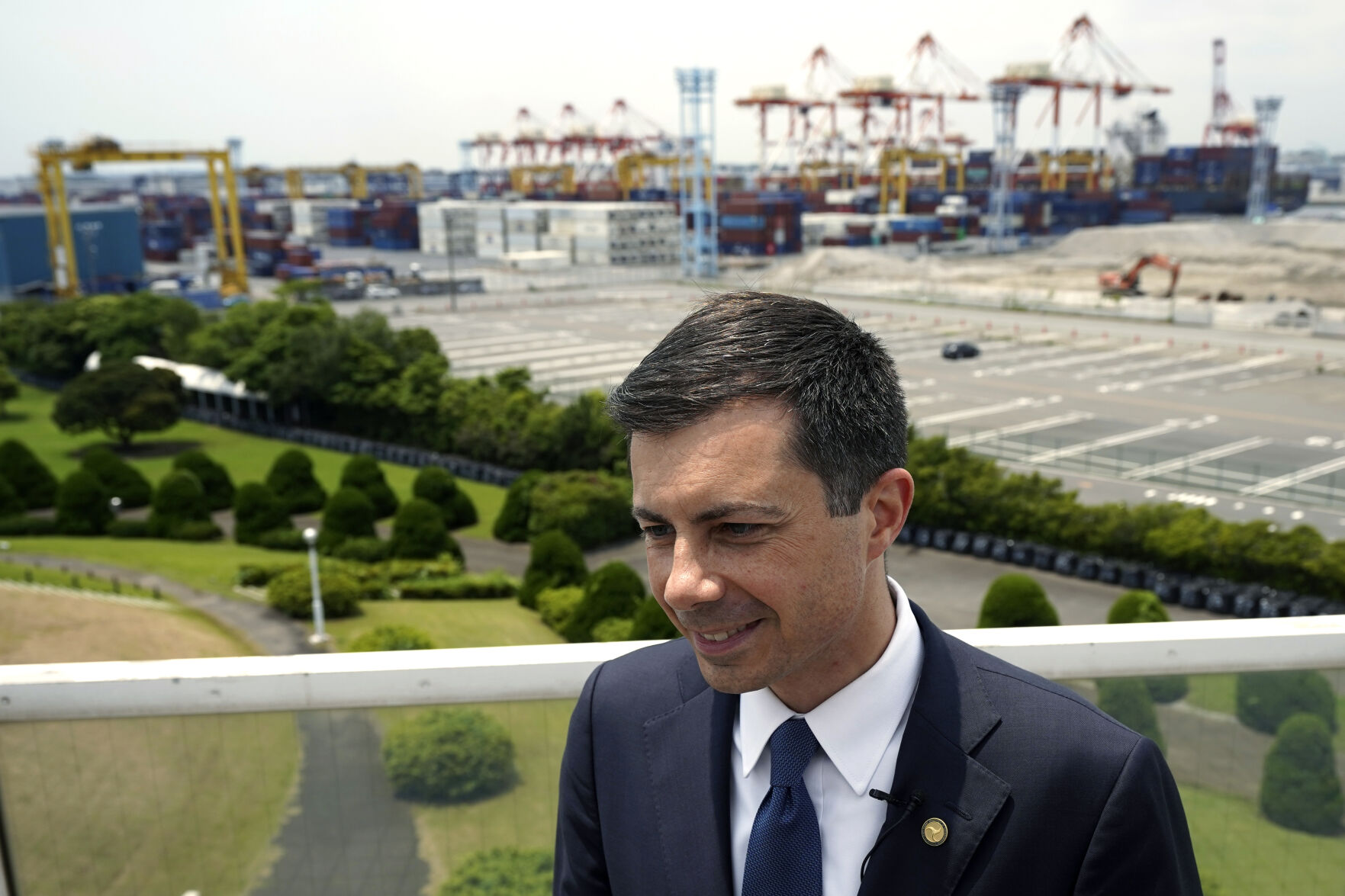 <p>U.S. Secretary of Transportation Pete Buttigieg speaks during an interview with the Associated Press after touring Yokohama Port which includes a visit to a construction site for a new pier that will accommodate larger ships coming from the U.S. on Monday, June 19, 2023, in Tokyo. (AP Photo/Eugene Hoshiko)</p>   PHOTO CREDIT: Eugene Hoshiko 