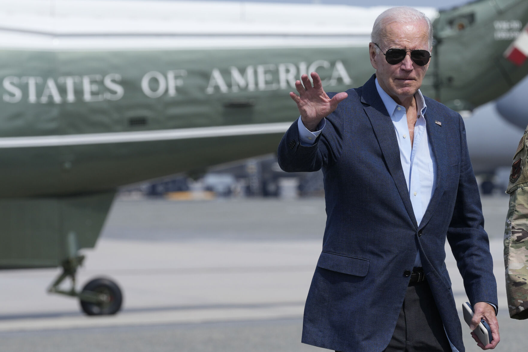 <p>President Joe Biden waves as he walks to board Air Force One at Dover Air Force Base, Del., Monday, June 19, 2023, as he heads to California. Biden is ramping up his reelection effort this week with four fundraisers in the San Francisco area, as his campaign builds up its coffers and lays strategic foundations for 2024. (AP Photo/Susan Walsh)</p>   PHOTO CREDIT: Susan Walsh