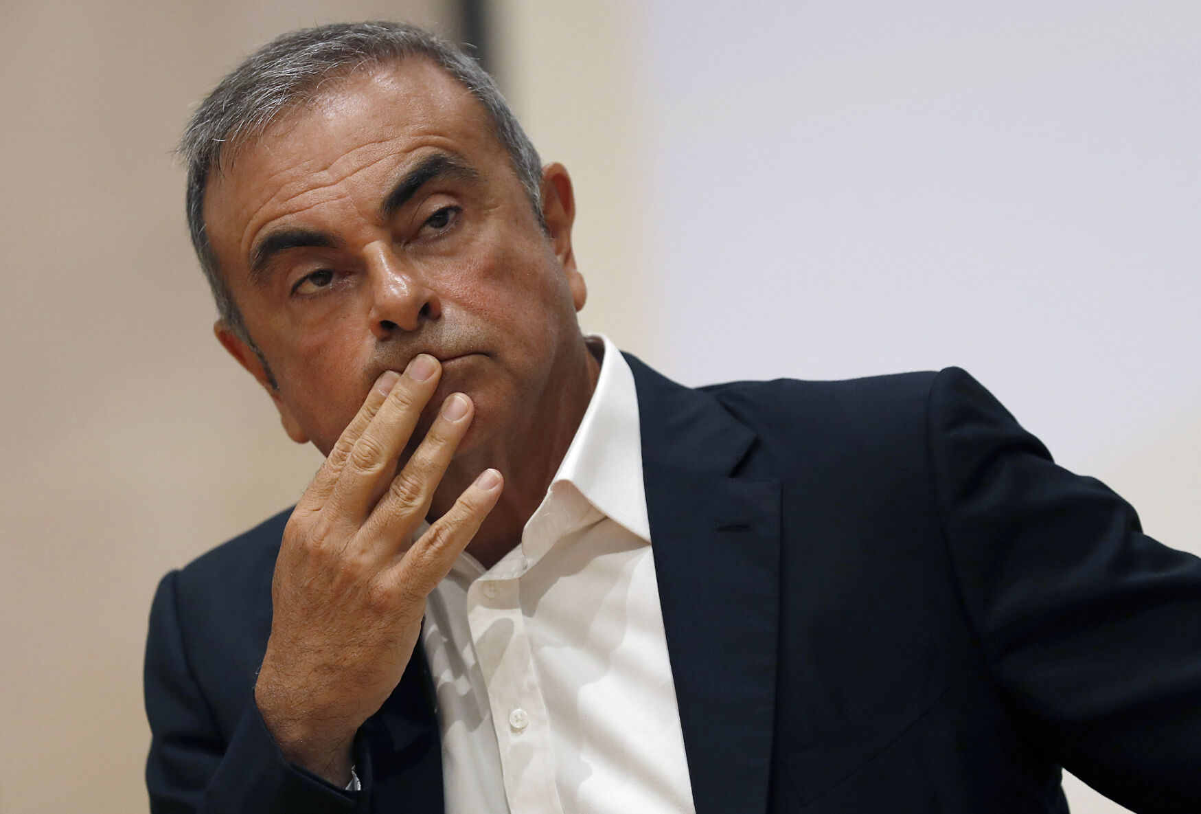 <p>FILE - Former Nissan Motor Co. Chairman Carlos Ghosn holds a press conference at the Maronite Christian Holy Spirit University of Kaslik, in Kaslik, north of Beirut, Lebanon, on Sept. 29, 2020. A Lebanese judge on Monday June 19, 2023, questioned auto tycoon Carlos Ghosn in Beirut over possible links to a former French Cabinet minister who was charged two years ago for dealing with him, officials familiar with the case said. (AP Photo/Hussein Malla, File)</p>   PHOTO CREDIT: Hussein Malla 