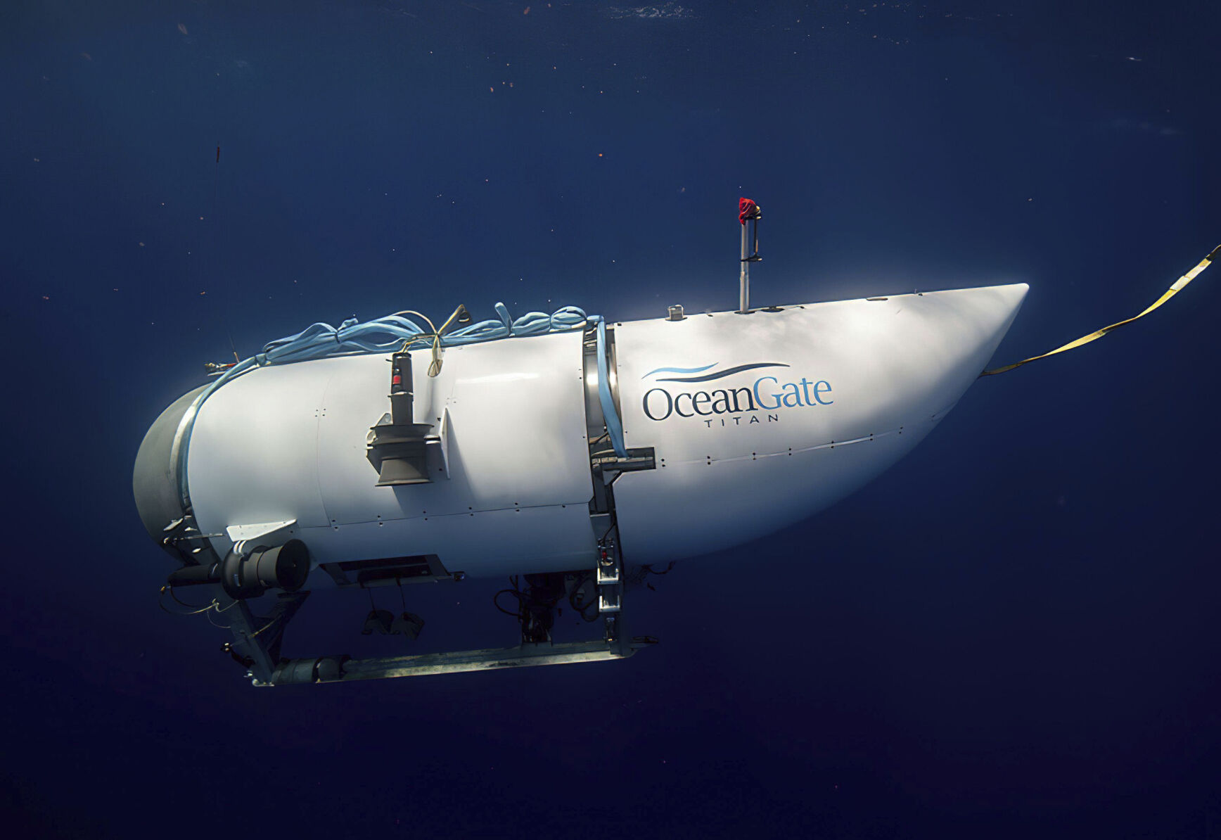 <p>This photo provided by OceanGate Expeditions shows a submersible vessel named Titan used to visit the wreckage site of the Titanic. In a race against the clock on the high seas, an expanding international armada of ships and airplanes searched Tuesday, June 20, 2023, for the submersible that vanished in the North Atlantic while taking five people down to the wreck of the Titanic. (OceanGate Expeditions via AP)</p>   PHOTO CREDIT: OceanGate Expeditions