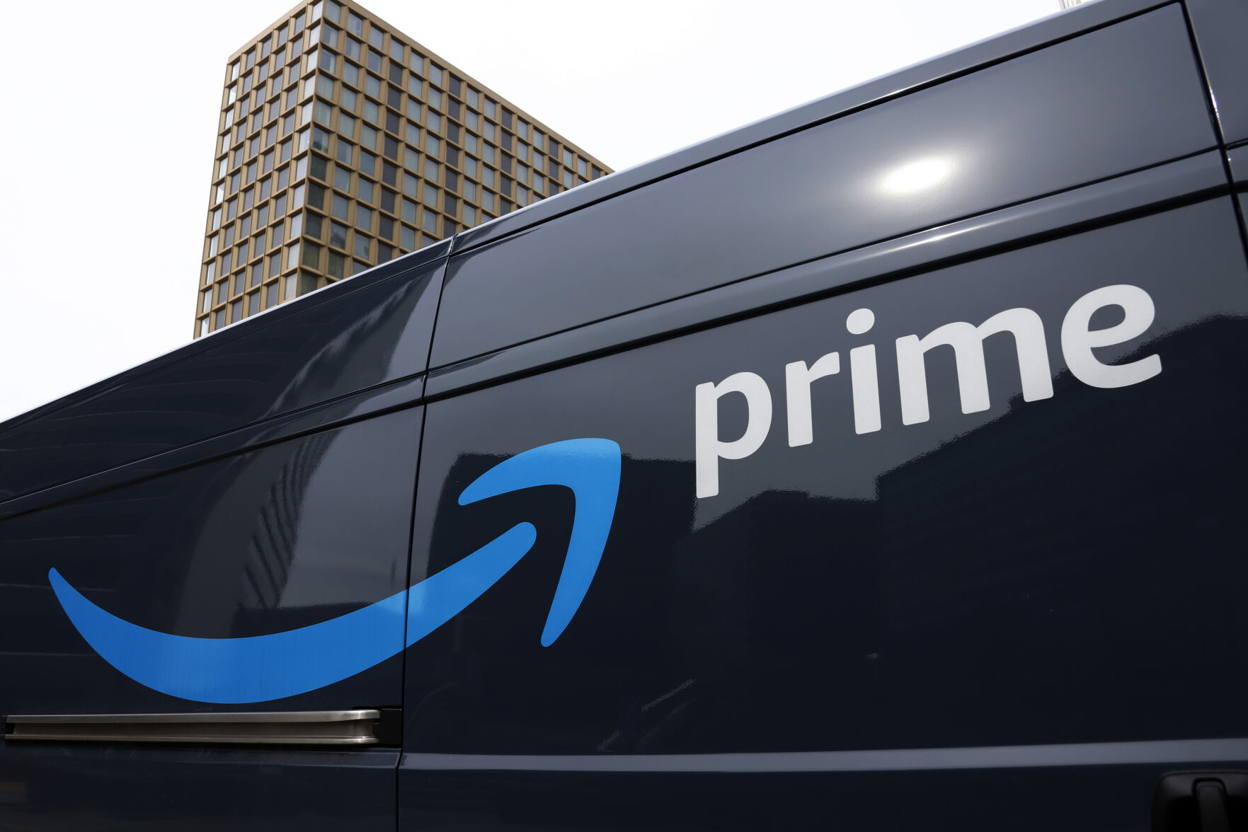 <p>FILE - An Amazon Prime delivery vehicle is seen in downtown Pittsburgh on March 18, 2020. The Federal Trade Commission sued Amazon on Wednesday for what it called a years-long effort to enroll consumers without consent into its Prime program and making it difficult for them to cancel their subscriptions. (AP Photo/Gene J. Puskar, File)</p>   PHOTO CREDIT: Gene J. Puskar