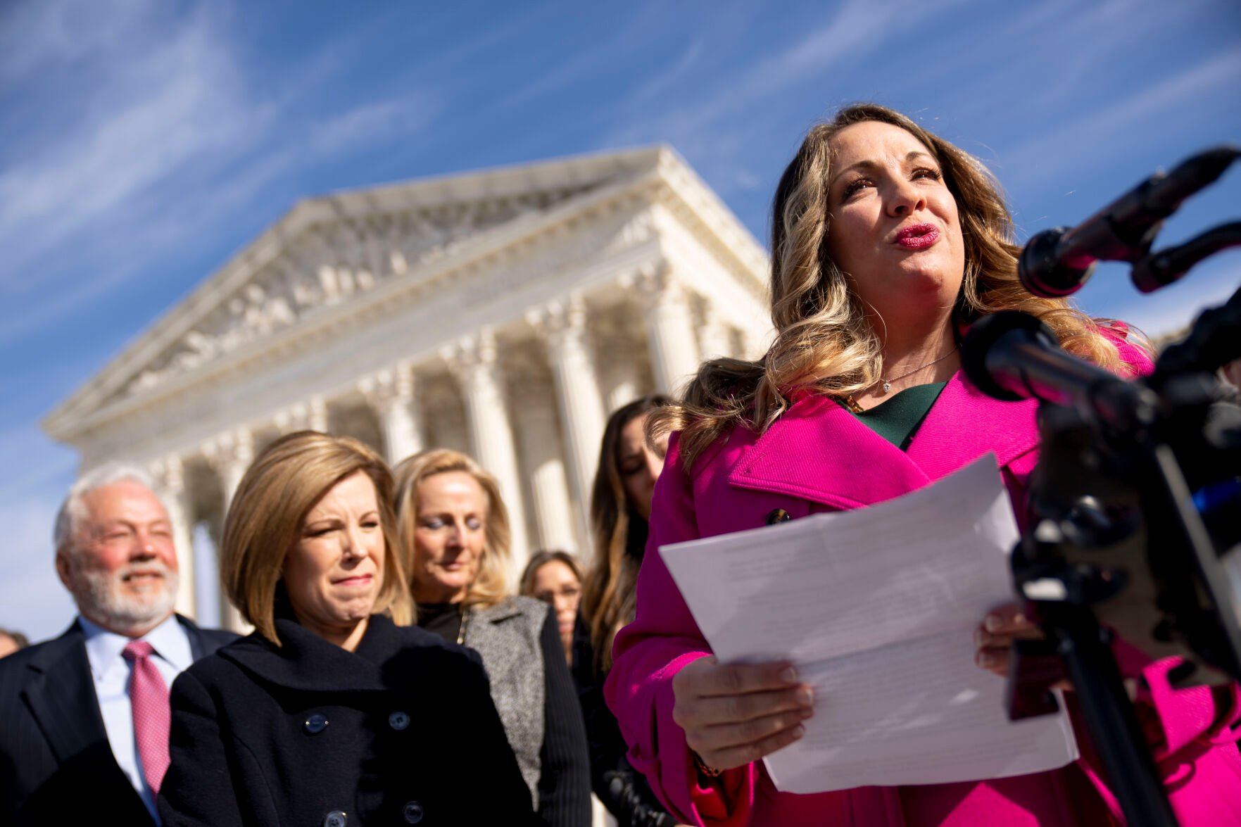 <p>FILE - Lorie Smith, a Christian graphic artist and website designer in Colorado, right, accompanied by her lawyer, Kristen Waggoner of the Alliance Defending Freedom, second from left, speaks outside the Supreme Court in Washington, Monday, Dec. 5, 2022, after her case was heard before the Supreme Court. (AP Photo/Andrew Harnik, File)</p>   PHOTO CREDIT: Andrew Harnik - staff, AP