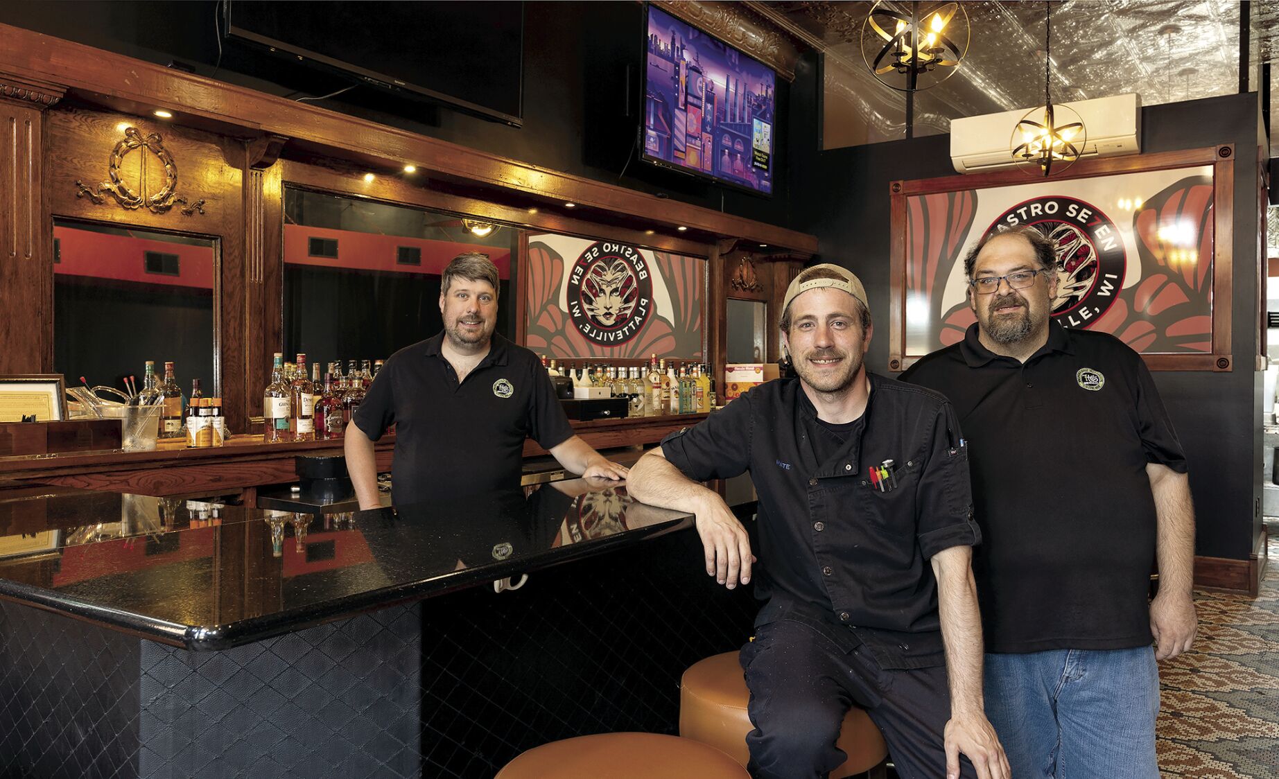 Seven Hills front of house manager Jeremy Hall (from left), Beastro Se7en chef Nate Holland and General Manager John Reuter inside Beastro Se7en on Second Street in Platteville, Wis., on Thursday.    PHOTO CREDIT: Stephen Gassman