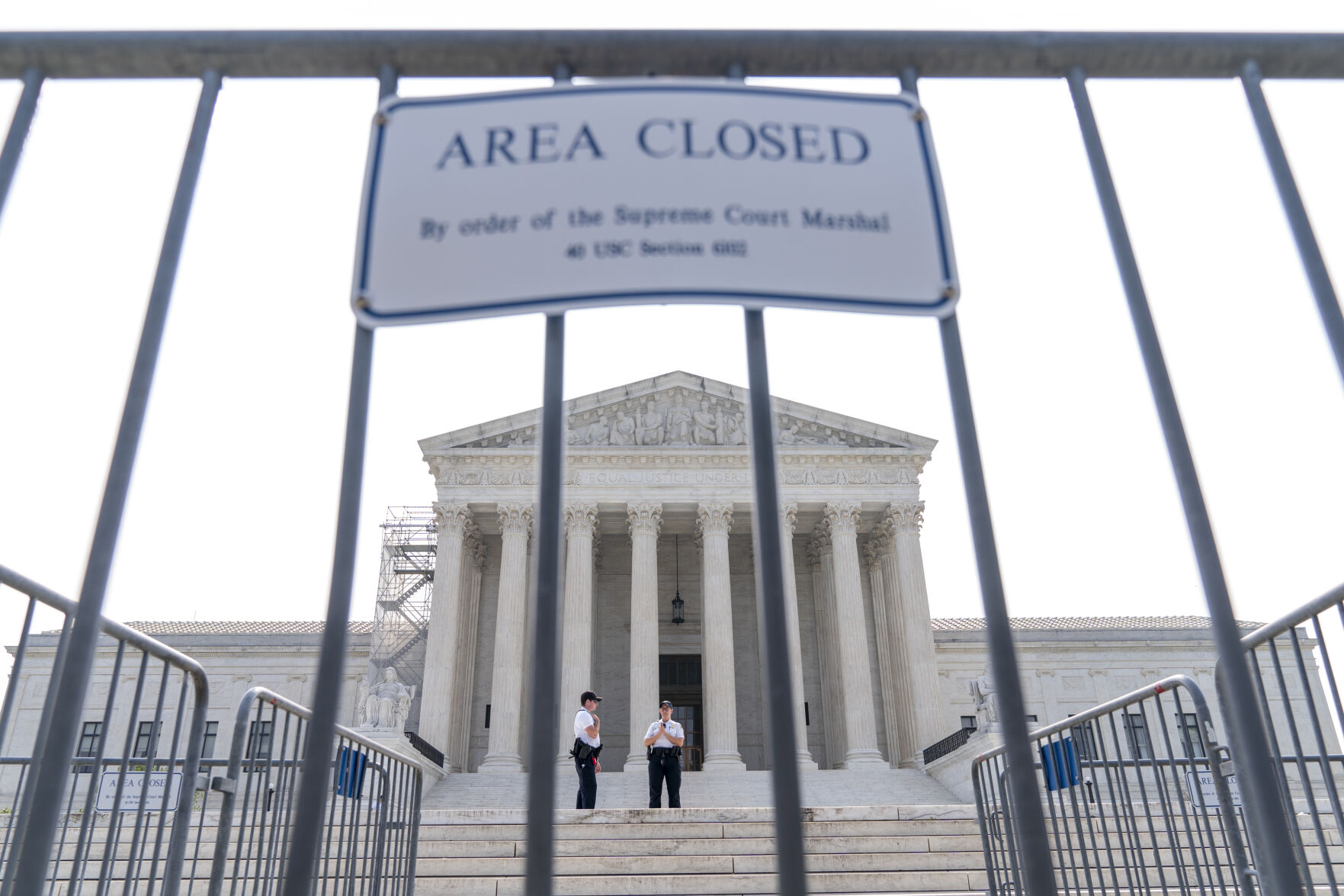 <p>Security works on the steps of the Supreme Court, Friday, June 30, 2023, as decisions are expected in Washington. (AP Photo/Jacquelyn Martin)</p>   PHOTO CREDIT: Jacquelyn Martin - staff, AP