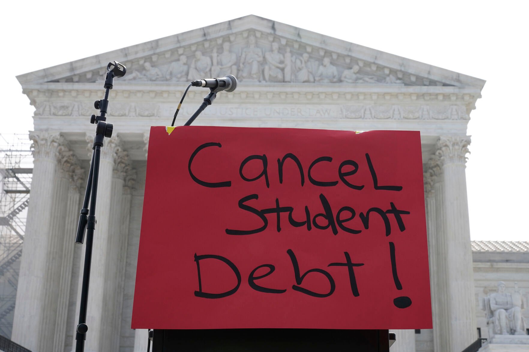 <p>A sign reading "cancel student debt" is seen outside the Supreme Court, Friday, June 30, 2023, as decisions are expected in Washington. (AP Photo/Mariam Zuhaib)</p>   PHOTO CREDIT: Mariam Zuhaib - staff, AP