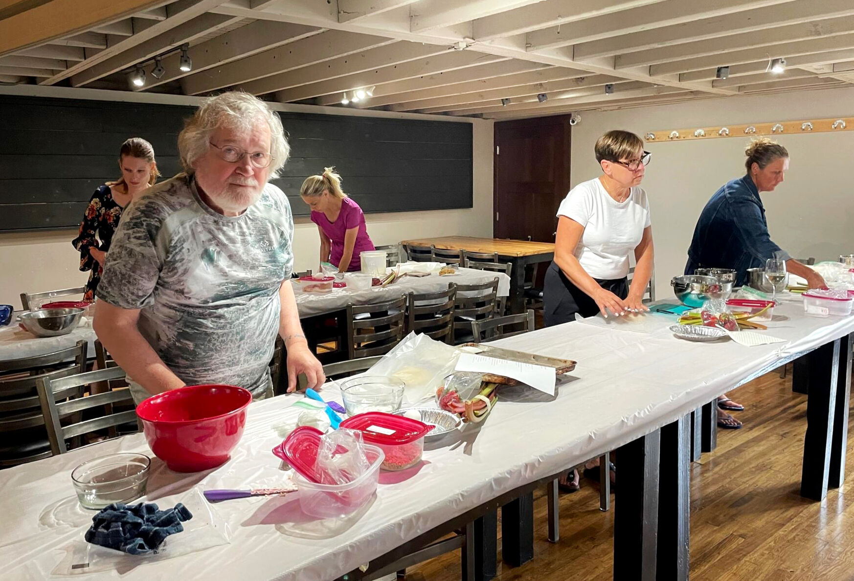 People participate in a Lynnies’ Kitchen class.    PHOTO CREDIT: Contributed