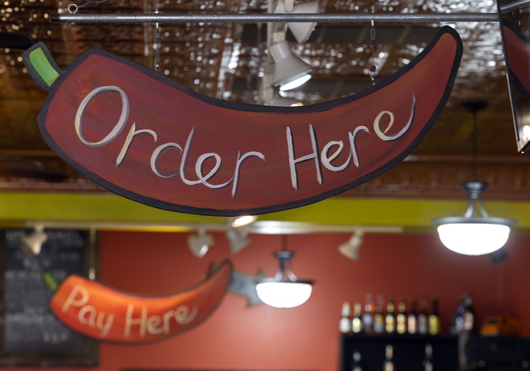 The order sign at Adobos Mexican Grill in Dubuque.    PHOTO CREDIT: Stephen Gassman