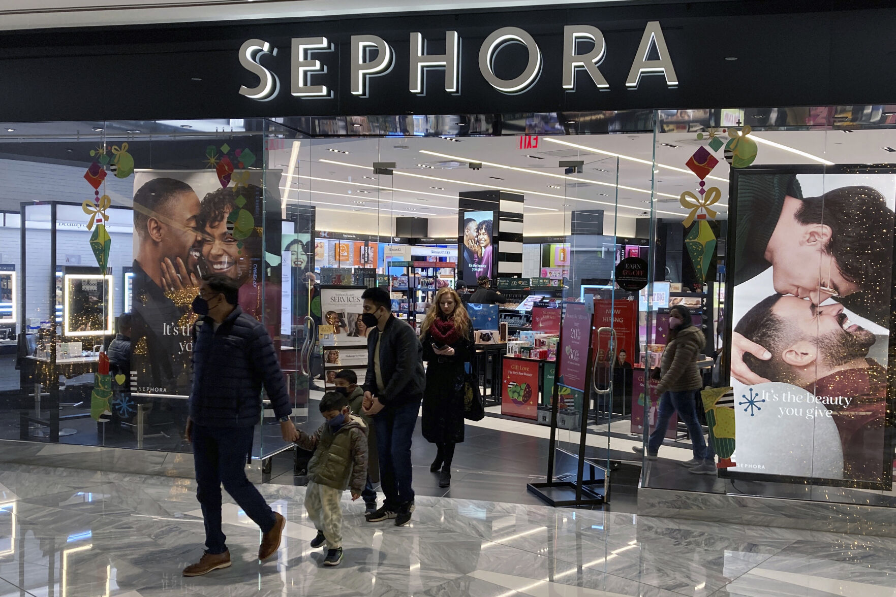 <p>File - People leave a Sephora store in the Hudson Yards shopping mall in New York City on Saturday, December 4, 2021. On June 1, Sephora started requiring a $25 minimum purchase for online customers looking to claim a free gift and 250 loyalty points during their birthday month. (AP Photo/Ted Shaffrey, File)</p>   PHOTO CREDIT: Ted Shaffrey - staff, AP