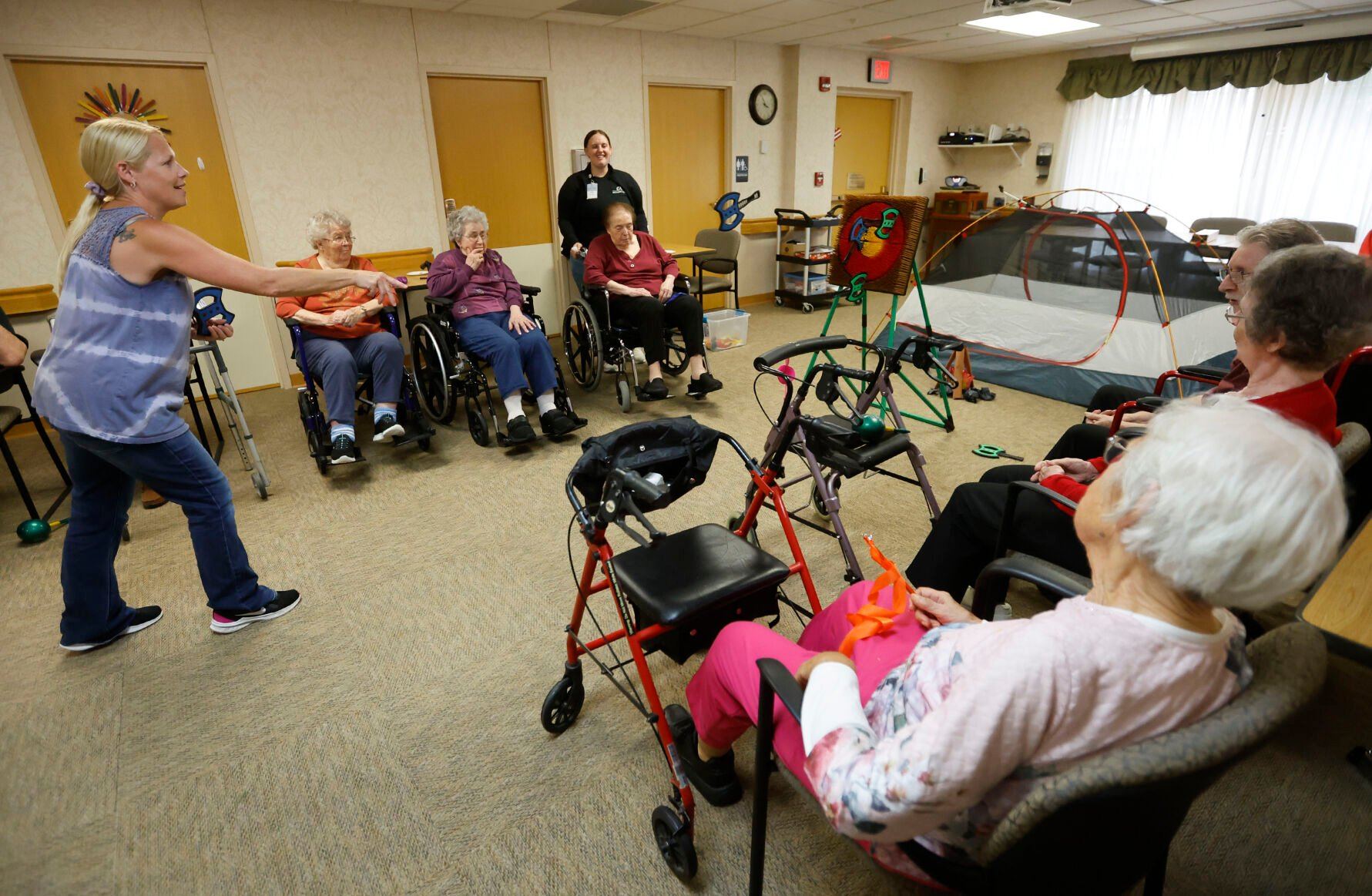 Julie Delaney, activities coordinator at Bethany Home, participates in an activity with residents at the facility.    PHOTO CREDIT: JESSICA REILLY
Telegraph Herald