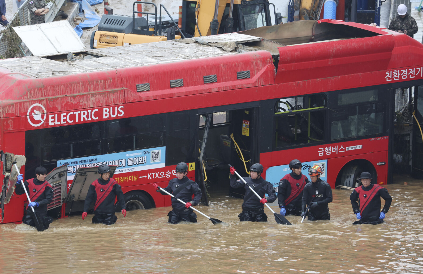 <p>FILE - Rescuers conduct a search operation along a road submerged by floodwaters leading to an underground tunnel in Cheongju, South Korea, July 16, 2023. Countries in the Asia-Pacific region needs to drastically increase their investments in disaster warning systems and other tools to counter rising risks from climate change, a United Nations report said Tuesday, July 25, 2023. (Kim Ju-hyung/Yonhap via AP, File)</p>   PHOTO CREDIT: Kim Ju-hyung