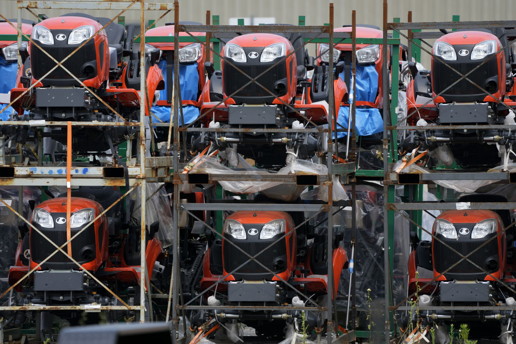 <p>Kubota tractors are stored in Uniontown, Pa., Friday, June 9, 2023. On Thursday, the Commerce Department issues its first of three estimates of how the U.S. economy performed in the second quarter of 2023. (AP Photo/Gene J. Puskar)</p>   PHOTO CREDIT: Gene J. Puskar 