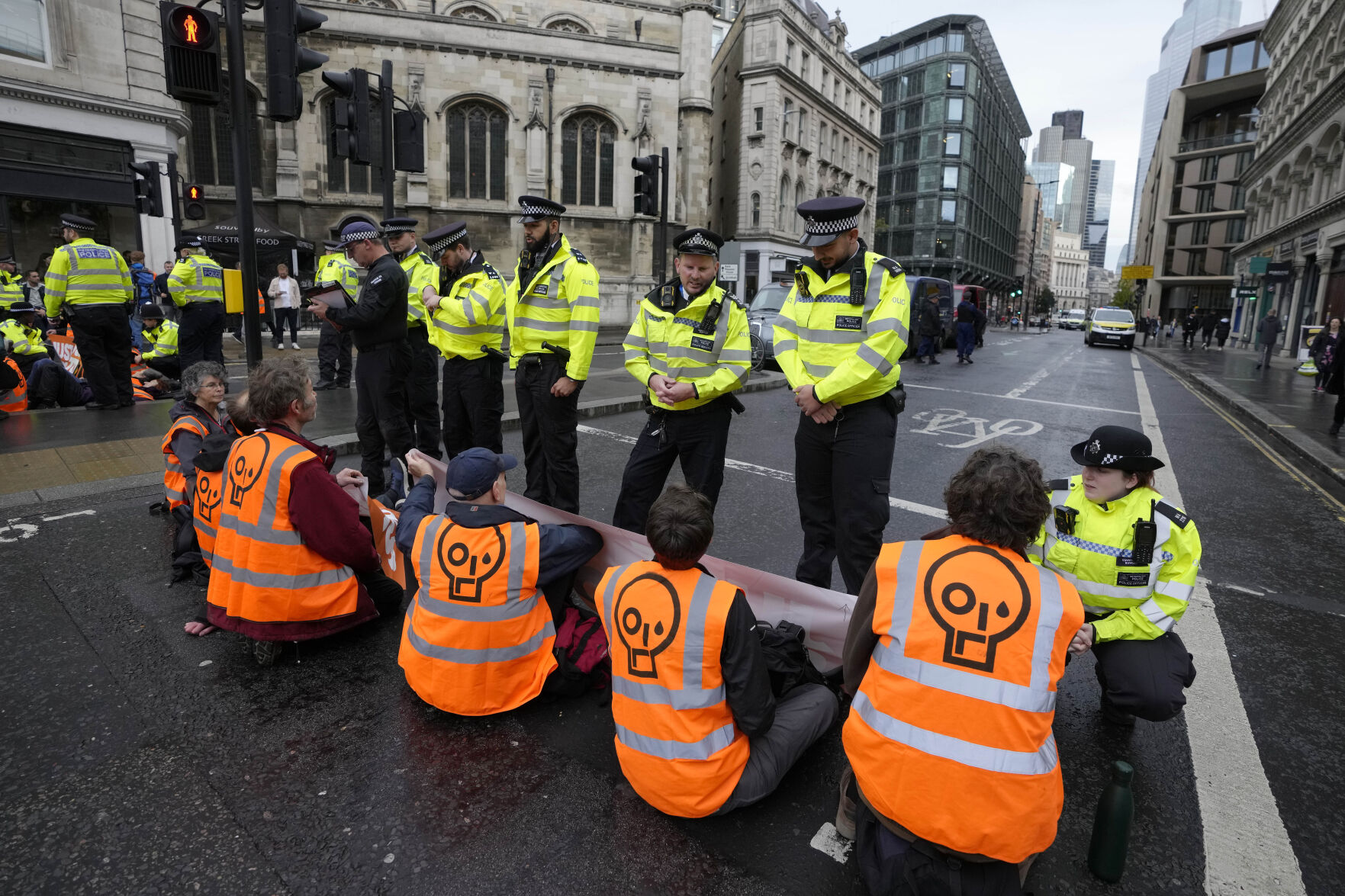 <p>FILE - Activists from the group Just Stop Oil block a road in London, on Oct. 27, 2022 demanding to stop future gas and oil projects from going ahead. Britain said on Monday July 31, 2023 it will grant hundreds of new oil and gas licenses in the North Sea in a bid for energy independence, ignoring calls from the environmental campaigners and the United Nations to stop the development of new fossil fuel projects. (AP Photo/Kirsty Wigglesworth, File)</p>   PHOTO CREDIT: Kirsty Wigglesworth