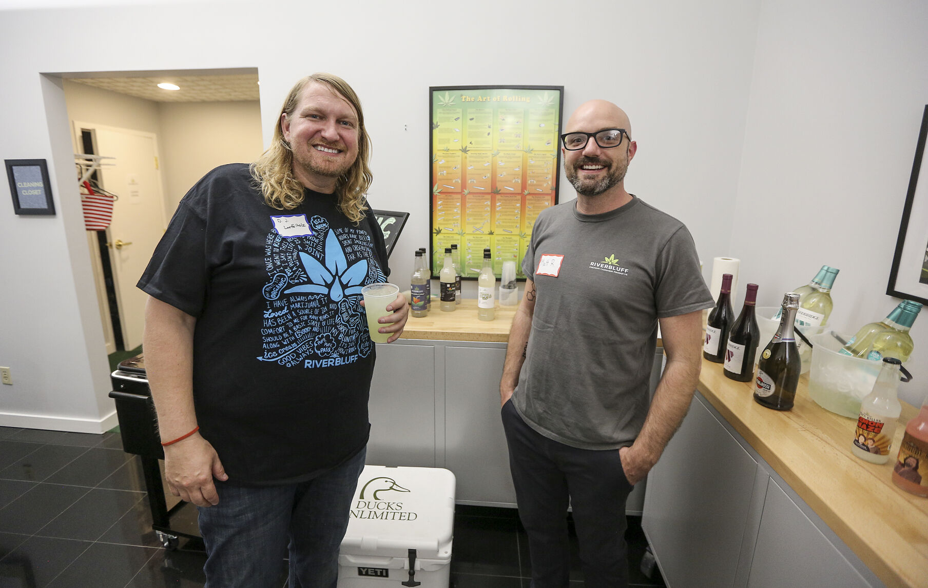 Co-owner of RiverBluff D.J. Leoffelholz (left) along with store manager Matt Rheault during a Business After Hours event held at RiverBluff’s headquarters in Dubuque.    PHOTO CREDIT: Dave Kettering