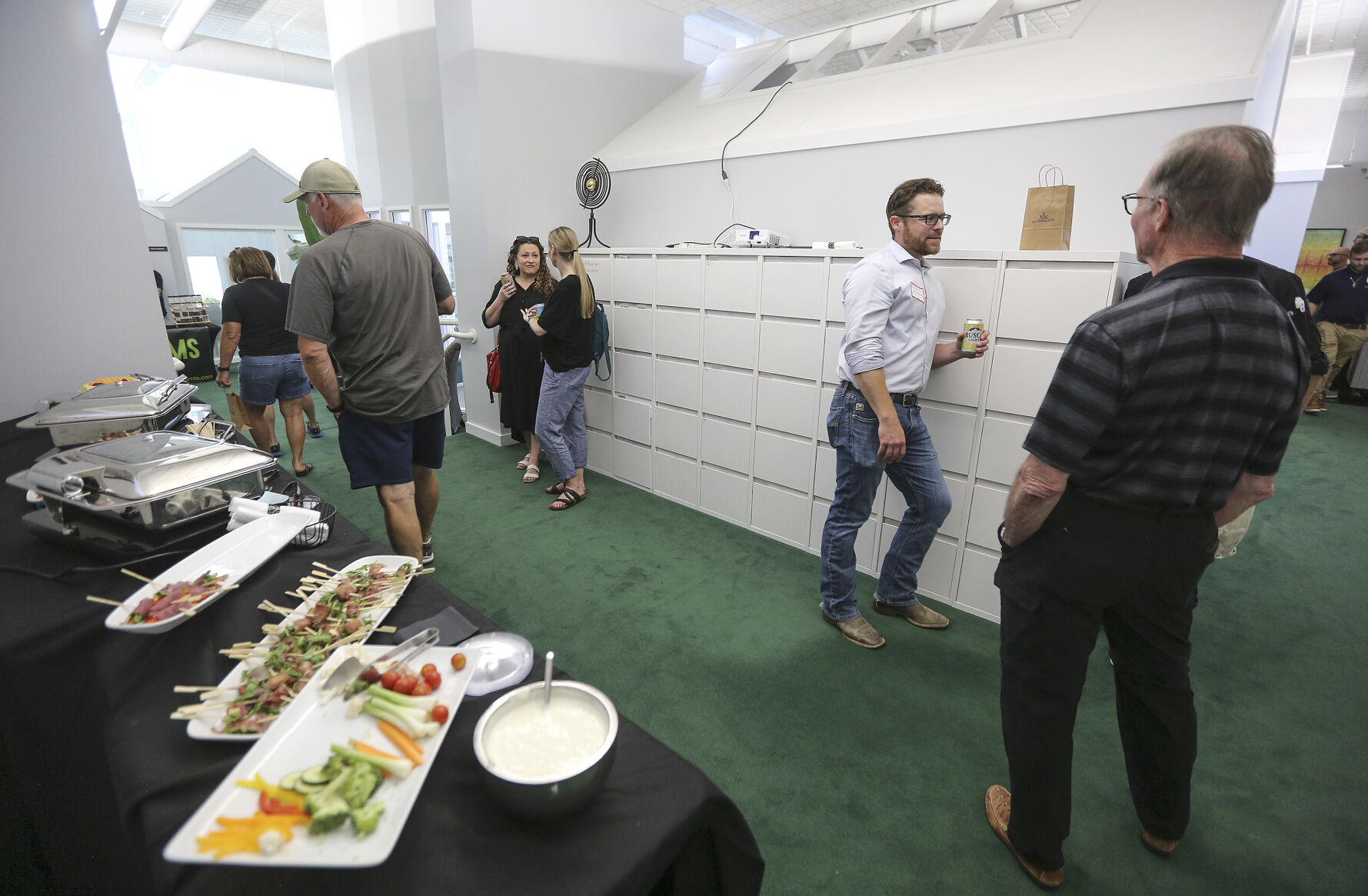 People mingle during a Business After Hours event held at RiverBluff