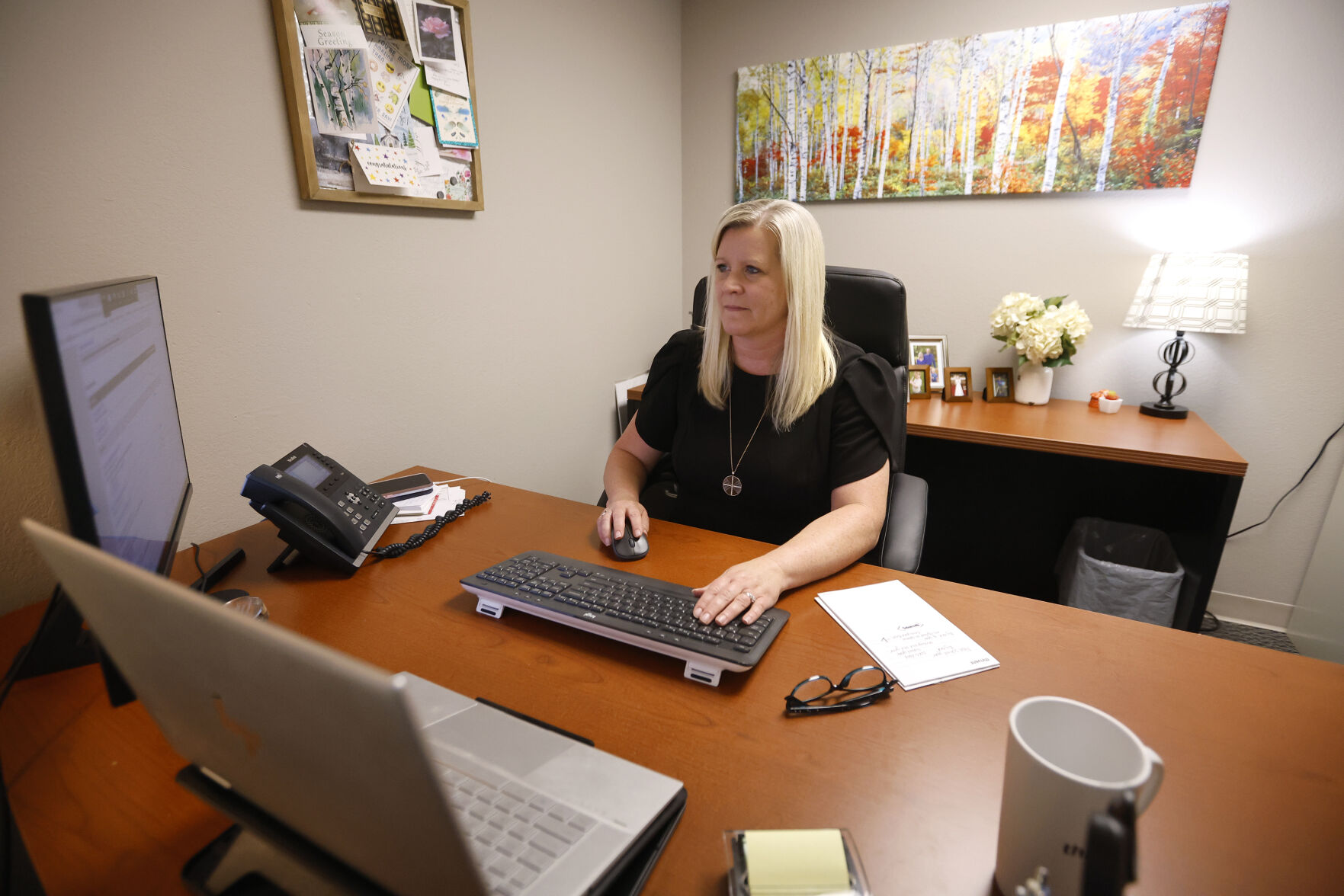 Financial advisor Jennifer Kreeb works on her computer at Thrivent in Dubuque.    PHOTO CREDIT: Jessica Reilly