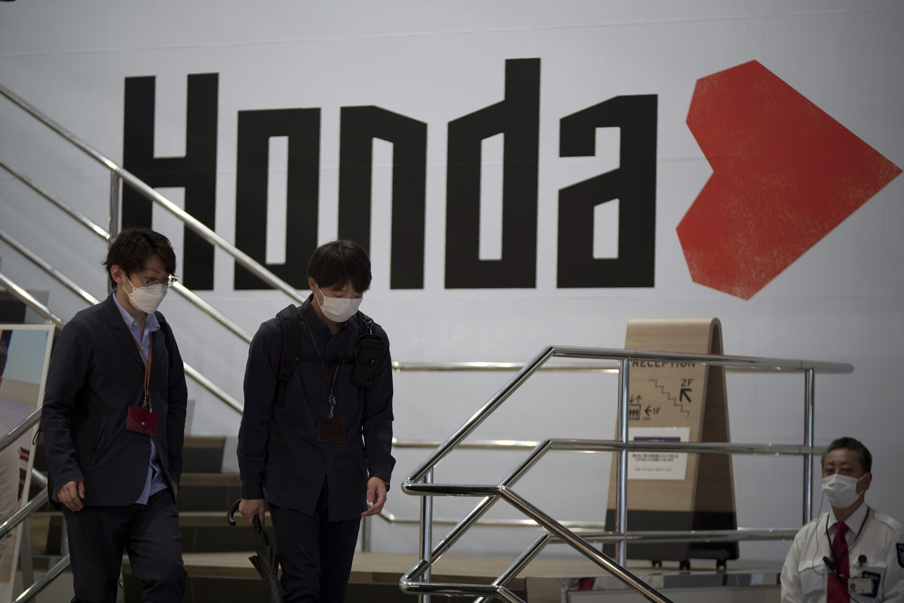 <p>FILE - People walk near the logo of Honda Motor Company at a showroom in Tokyo, May 13, 2022. Honda reported Wednesday, Aug. 9, 2023, that its April-June profit more than doubled on healthy sales of its motorcycles and cars, as the Japanese company also received a perk from favorable exchange rates. (AP Photo/Eugene Hoshiko, File)</p>   PHOTO CREDIT: Eugene Hoshiko 