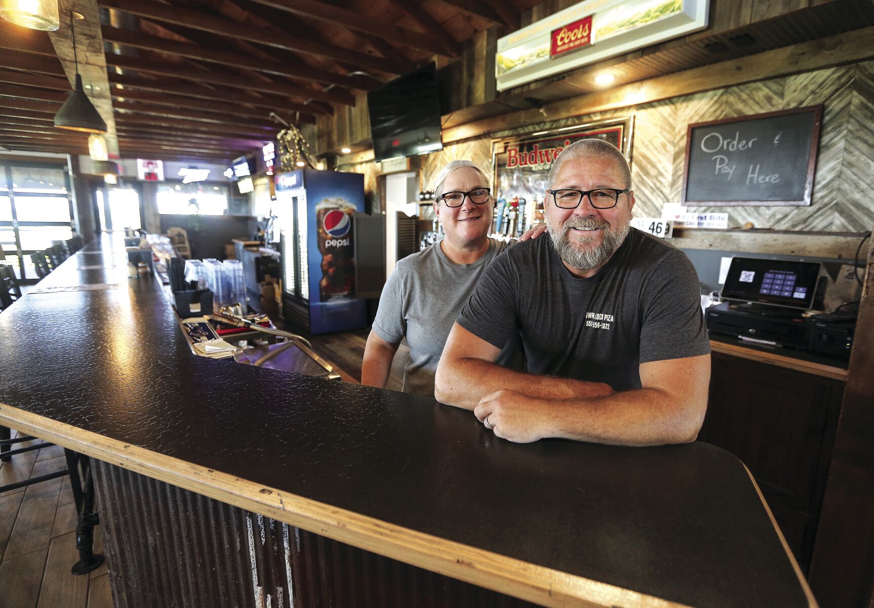 Scott and Irene Nelson are the owners of Town Clock Pizza in Centralia, Iowa.    PHOTO CREDIT: Dave Kettering