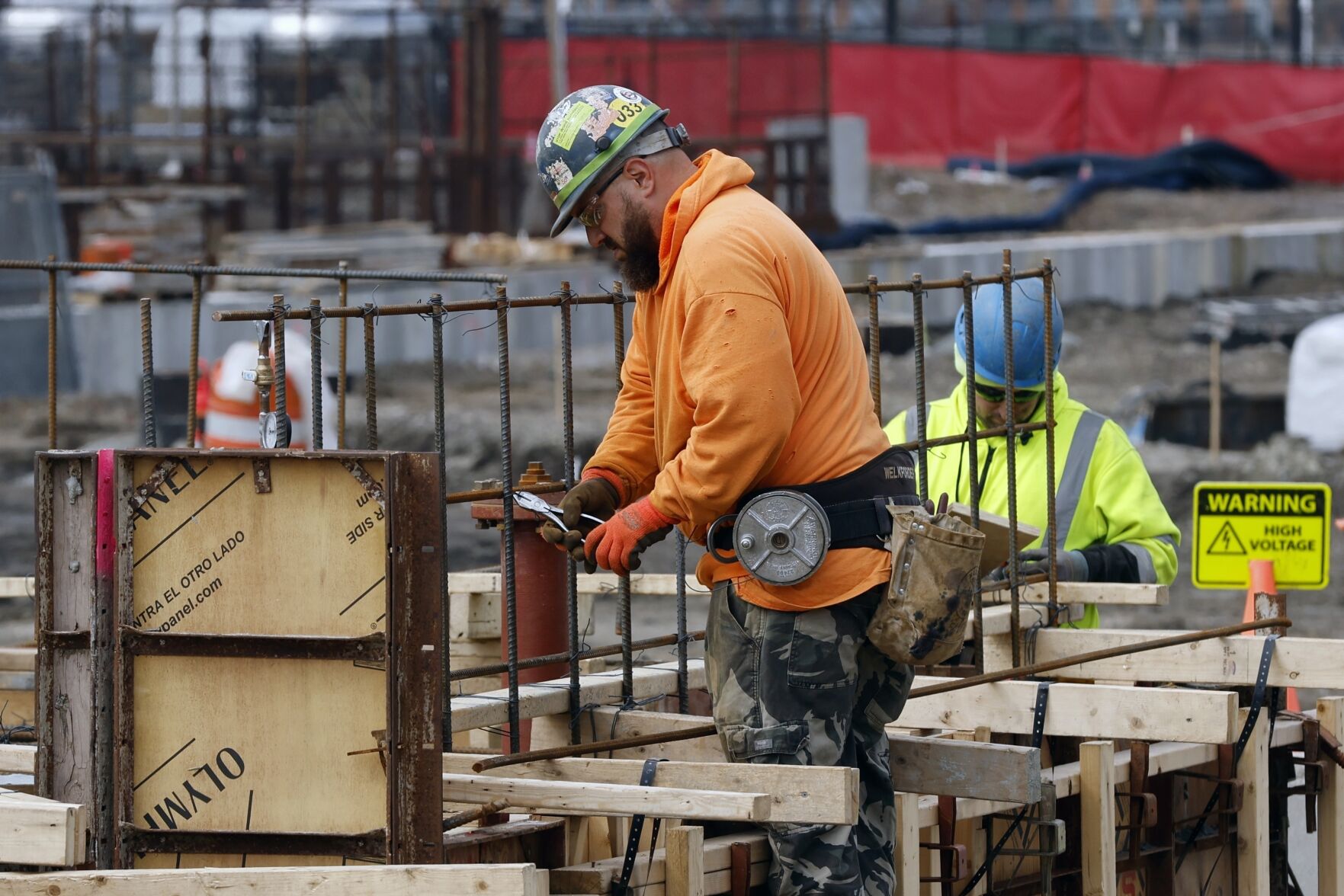 <p>File - A construction worker wires rebar for a foundation, Friday, March 17, 2023, in Boston. On Friday, the U.S. government issues the August jobs report. (AP Photo/Michael Dwyer, File)</p>   PHOTO CREDIT: Michael Dwyer - staff, ASSOCIATED PRESS