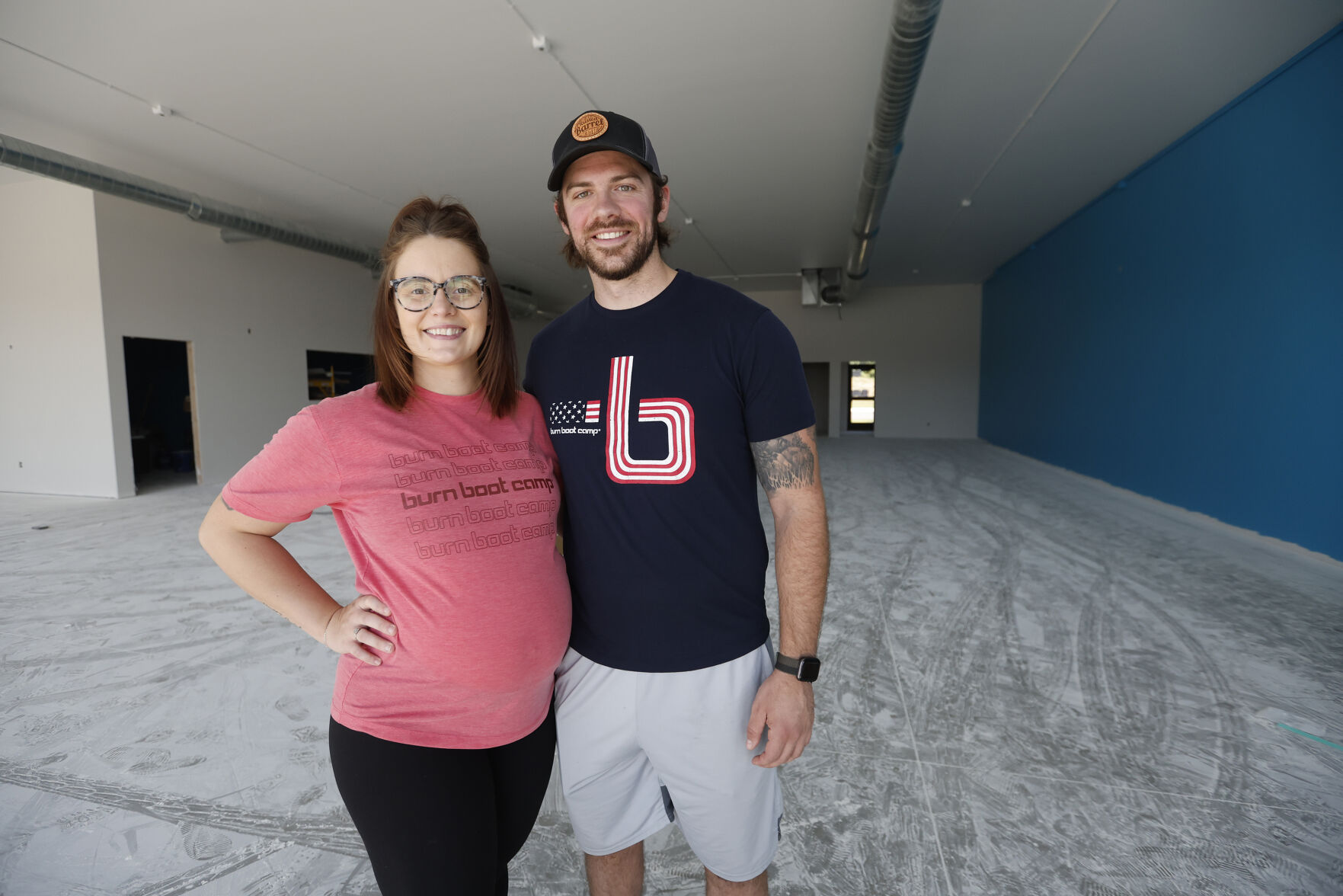 Owners Tiffany Raisbeck (left) and Kyle Hoppman will open Burn Boot Camp on Stoneman Road in Dubuque.    PHOTO CREDIT: JESSICA REILLY