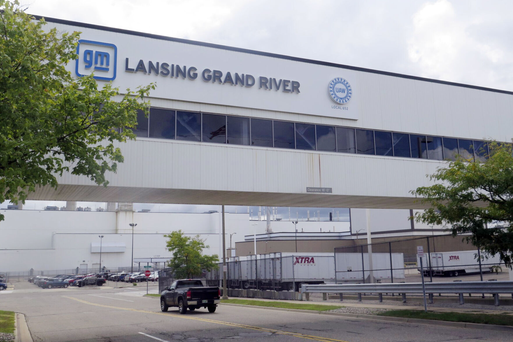 <p>A vehicle enters General Motor’s Lansing Grand River Assembly plant, Tuesday, Sept. 12, 2023, in Lansing, Mich., just days before auto workers could potentially strike due failed contract negotiations. (AP Photo/Joey Cappelletti)</p>   PHOTO CREDIT: Joey Cappelletti 