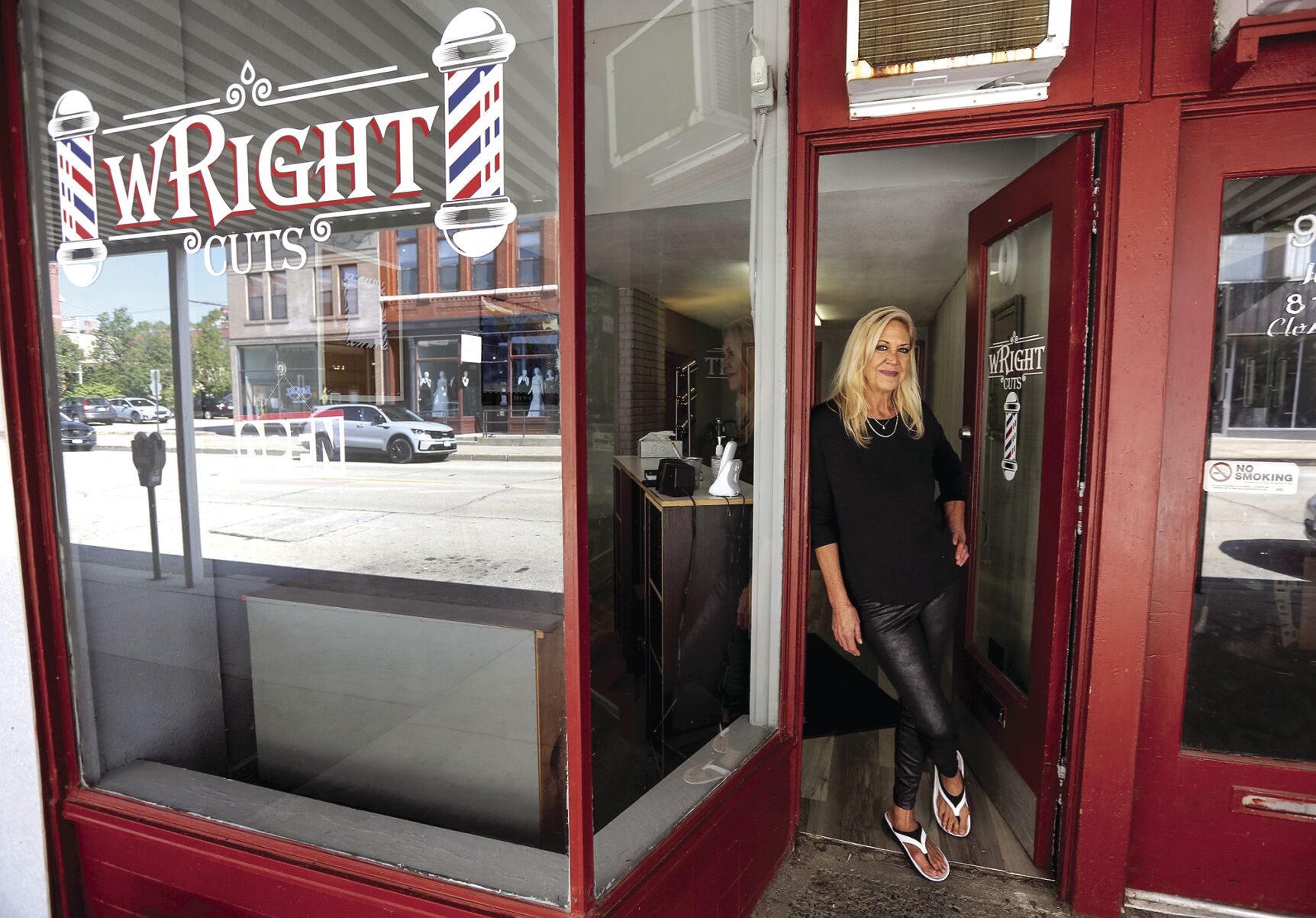 Nancy Wright is the owner of Wright Cuts, located on Main Street in Dubuque.    PHOTO CREDIT: Dave Kettering