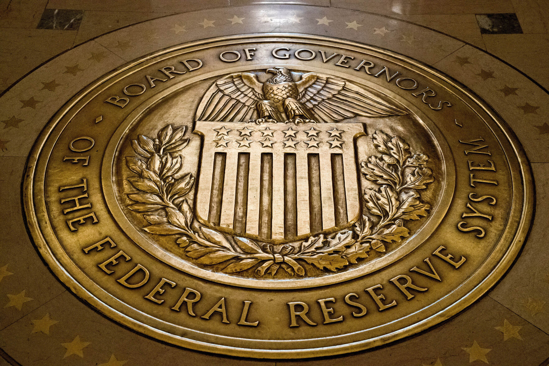 <p>FILE- The seal of the Board of Governors of the United States Federal Reserve System is displayed in the ground at the Marriner S. Eccles Federal Reserve Board Building in Washington, Feb. 5, 2018. Since Federal Reserve officials last met in July, the economy has moved in the direction they hoped to see: Inflation continues to ease, if more slowly than before, while growth remains solid and the job market cools. (AP Photo/Andrew Harnik, File)</p>   PHOTO CREDIT: Andrew Harnik - staff, ASSOCIATED PRESS