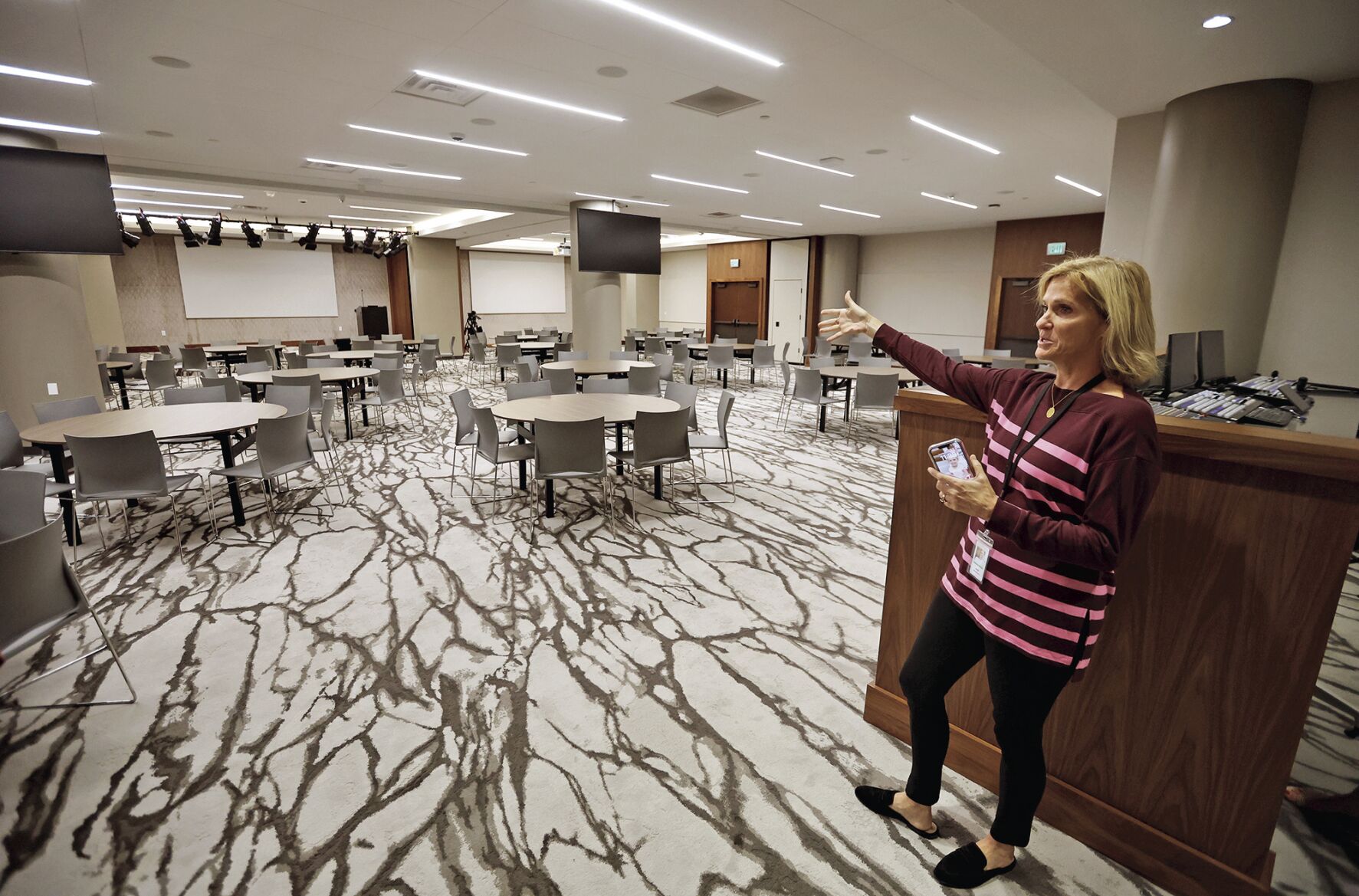 Angie Long, senior vice president at Cottingham & Butler, shows off a meeting room shared by Cottingham & Butler and HTLF at the Roshek Building in Dubuque on Tuesday, Sept. 26, 2023.    PHOTO CREDIT: JESSICA REILLY