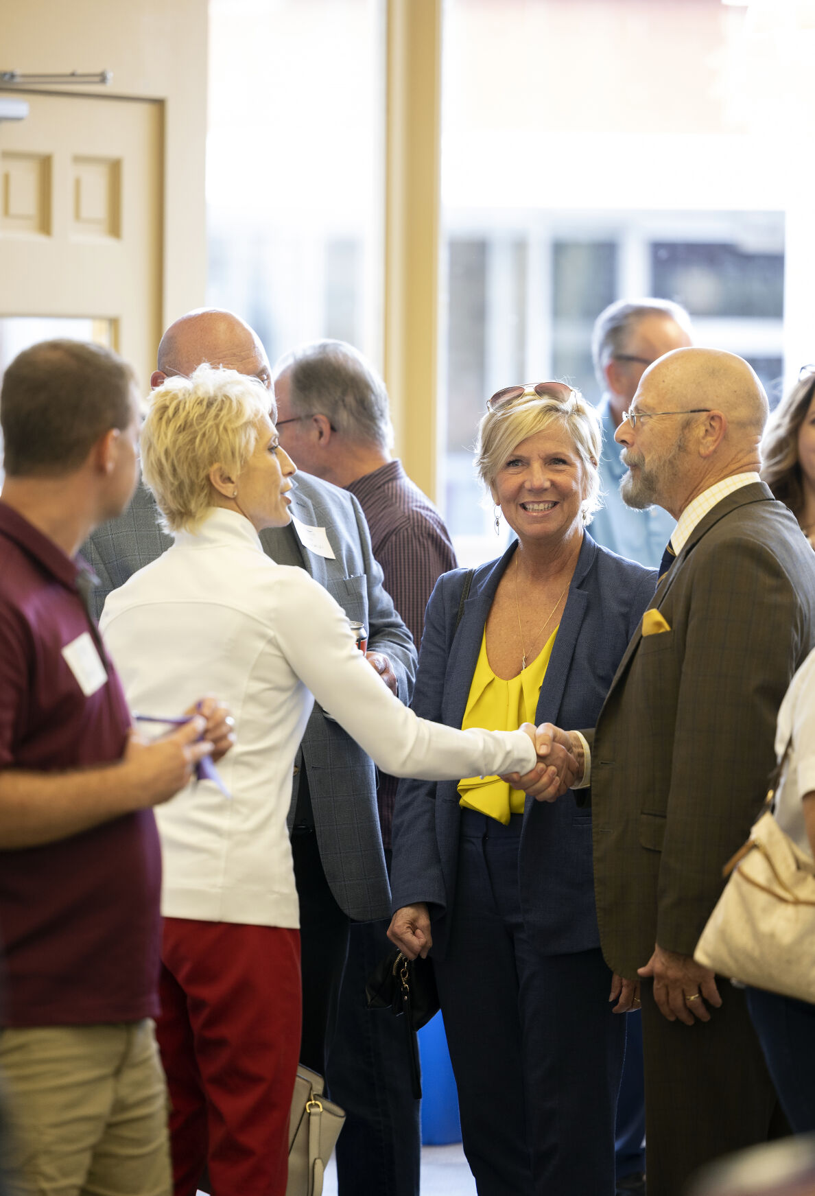 Visitors chat and mingle as FEH Design in Dubuque hosts the September Business After Hours.    PHOTO CREDIT: Stephen Gassman