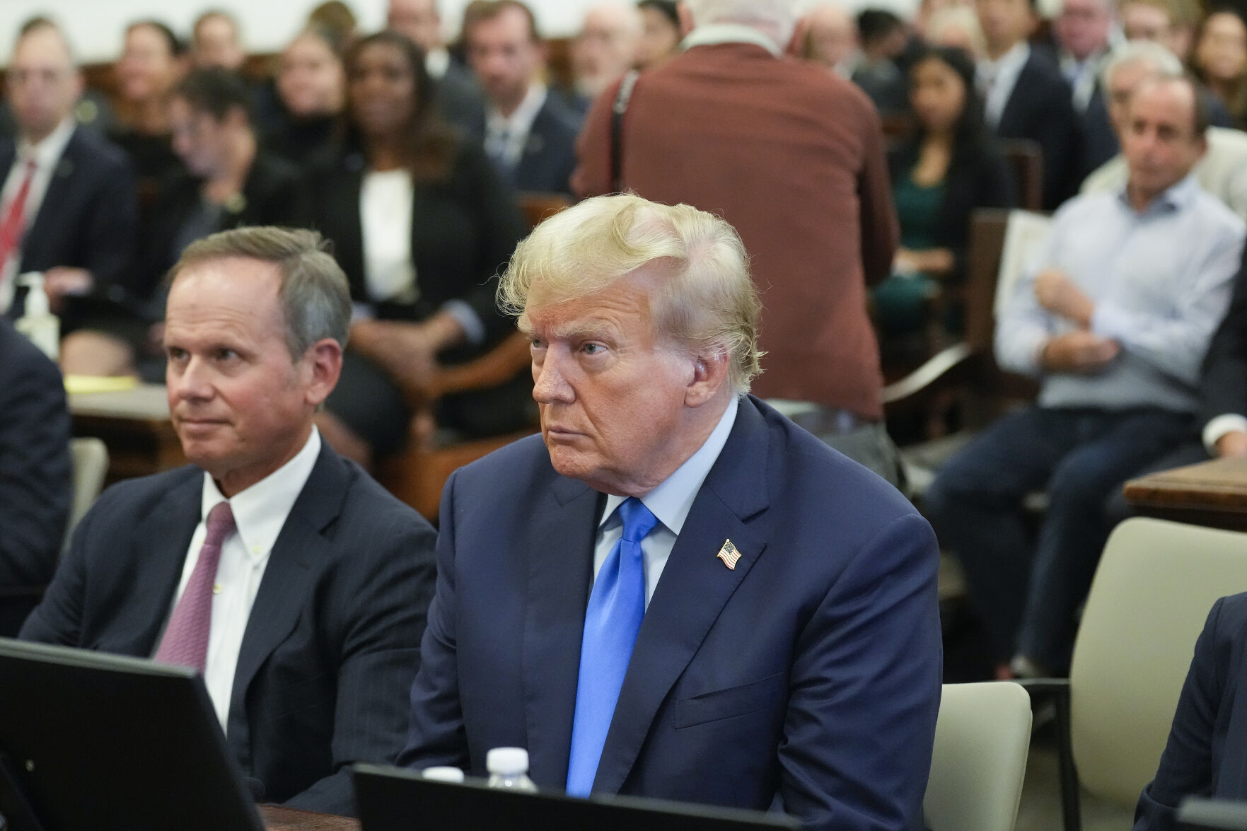 <p>Former President Donald Trump, right, sits in the courtroom at New York Supreme Court, Monday, Oct. 2, 2023, in New York. Trump is making a rare, voluntary trip to court in New York for the start of a civil trial in a lawsuit that already has resulted in a judge ruling that he committed fraud in his business dealings. (AP Photo/Seth Wenig, Pool)</p>   PHOTO CREDIT: Seth Wenig 