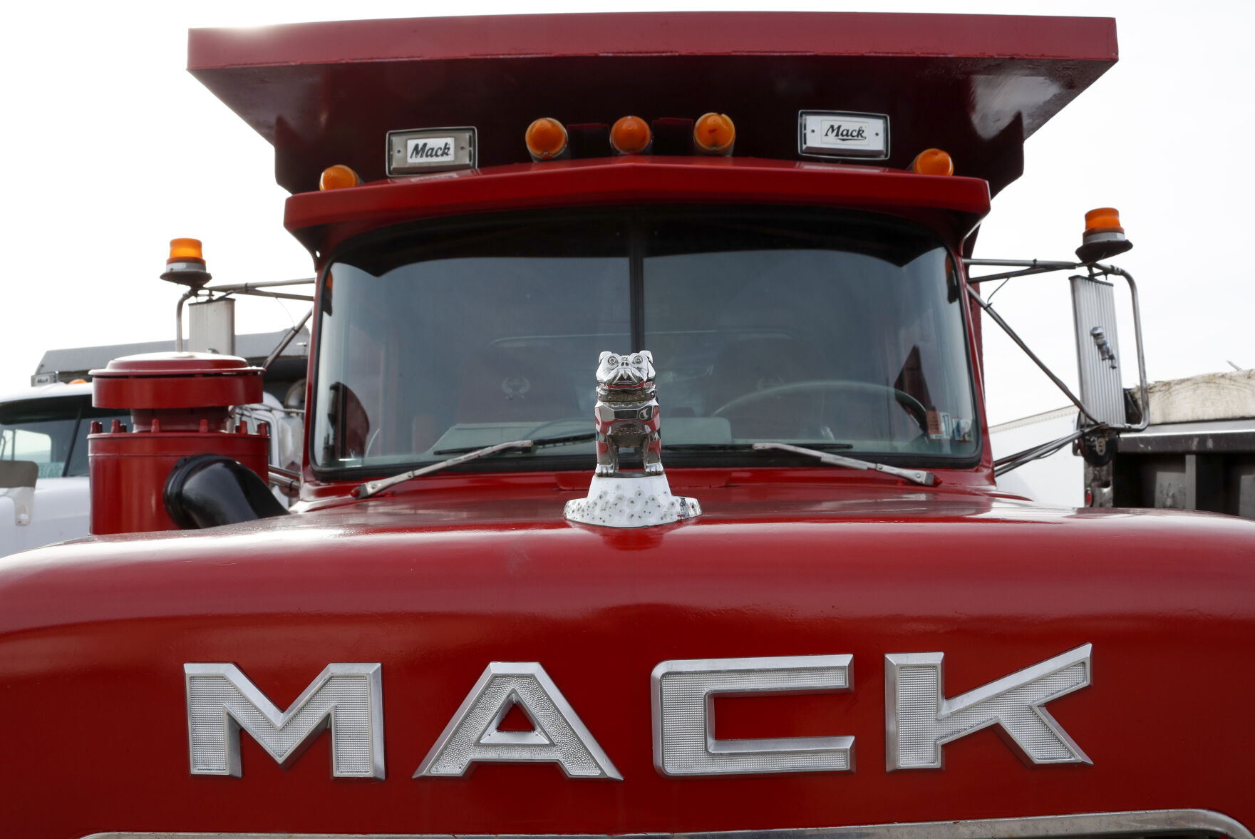 <p>File - A hood ornament is seen on a used Mack truck on a lot in Evans City, Pa., Jan. 9, 2020. Union workers at Mack Trucks have voted down a tentative five-year contract agreement reached with the company. (AP Photo/Keith Srakocic, File)</p>   PHOTO CREDIT: Keith Srakocic 