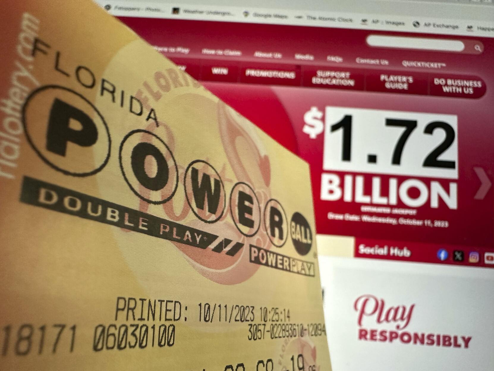 <p>A Powerball lottery ticket is shown, Wednesday, Oct. 11, 2023, in Surfside, Fla. After 35 straight drawings without a big winner, Powerball players are lining up for a shot at a near-record jackpot worth an estimated $1.73 billion. (AP Photo/Wilfredo Lee)</p>   PHOTO CREDIT: Wilfredo Lee 