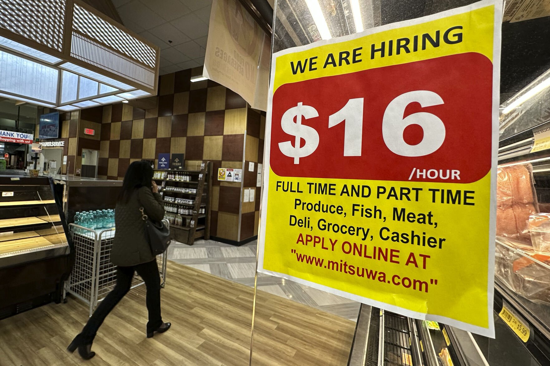 <p>A hiring sign is displayed at a grocery store in Arlington Heights, Ill., Tuesday, Oct. 10, 2023. On Thursday, the Labor Department reports on the number of people who applied for unemployment benefits last week. (AP Photo/Nam Y. Huh)</p>   PHOTO CREDIT: Nam Y. Huh 