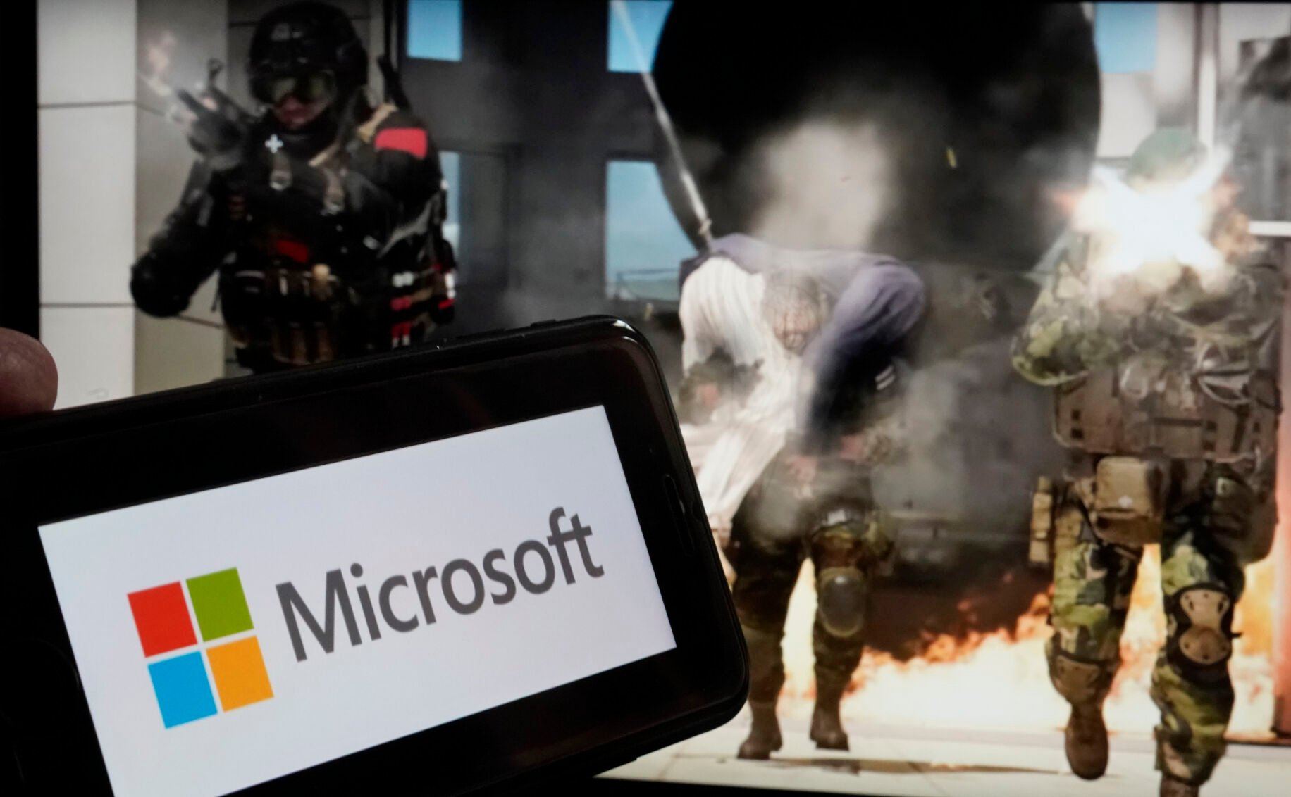 <p>FILE - The logo for Microsoft, and a scene from Activision "Call of Duty - Modern Warfare," are shown in this photo, in New York, June 21, 2023. Microsoft’s purchase of video game maker Activision Blizzard won final approval Friday, Oct. 13, from Britain’s competition watchdog, reversing its earlier decision to block the $69 billion deal and removing a last obstacle for one of the largest tech transactions in history. (AP Photo/Richard Drew, File)</p>   PHOTO CREDIT: Richard Drew - staff, ASSOCIATED PRESS