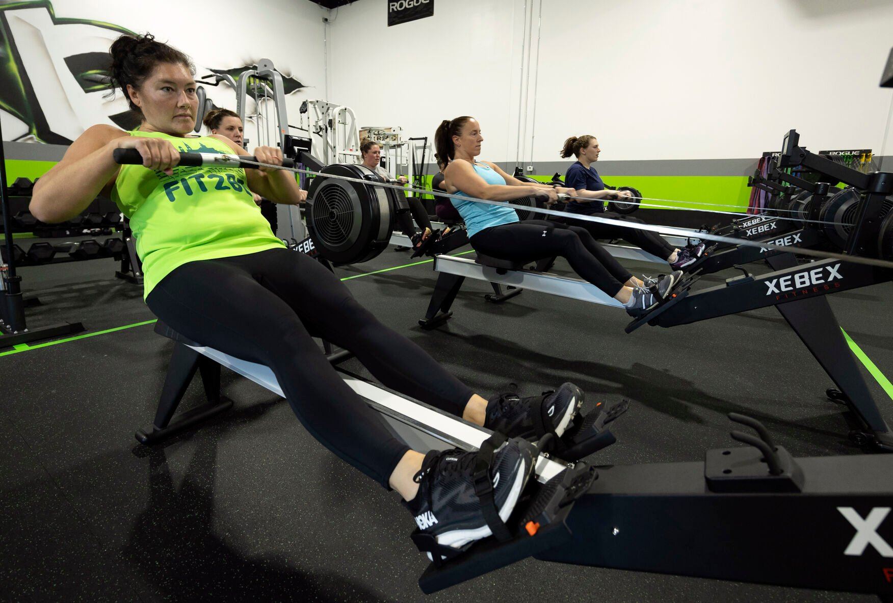 Students participate in a class at XRP Fitness in Dubuque.    PHOTO CREDIT: Gassman