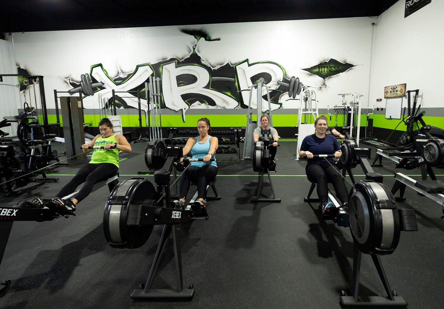 Students take part in a class at recently opened XRP Fitness, 190 N. Crescent Ridge, in Dubuque.    PHOTO CREDIT: Stephen Gassman