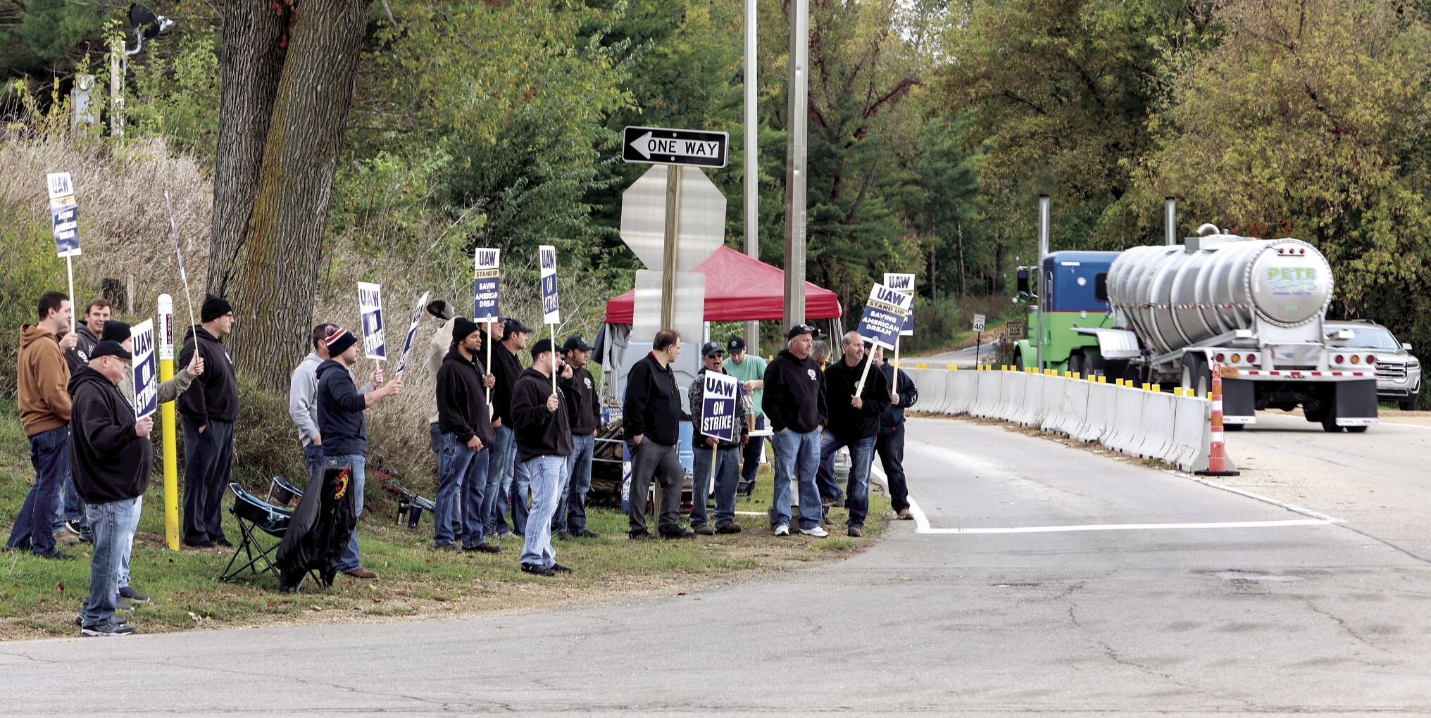 Union employees for East Dubuque Nitrogen Fertilizers LLC, of East Dubuque, Ill., strike near the plant’s entrance along U.S. 20 on Wednesday.    PHOTO CREDIT: Dave Kettering
