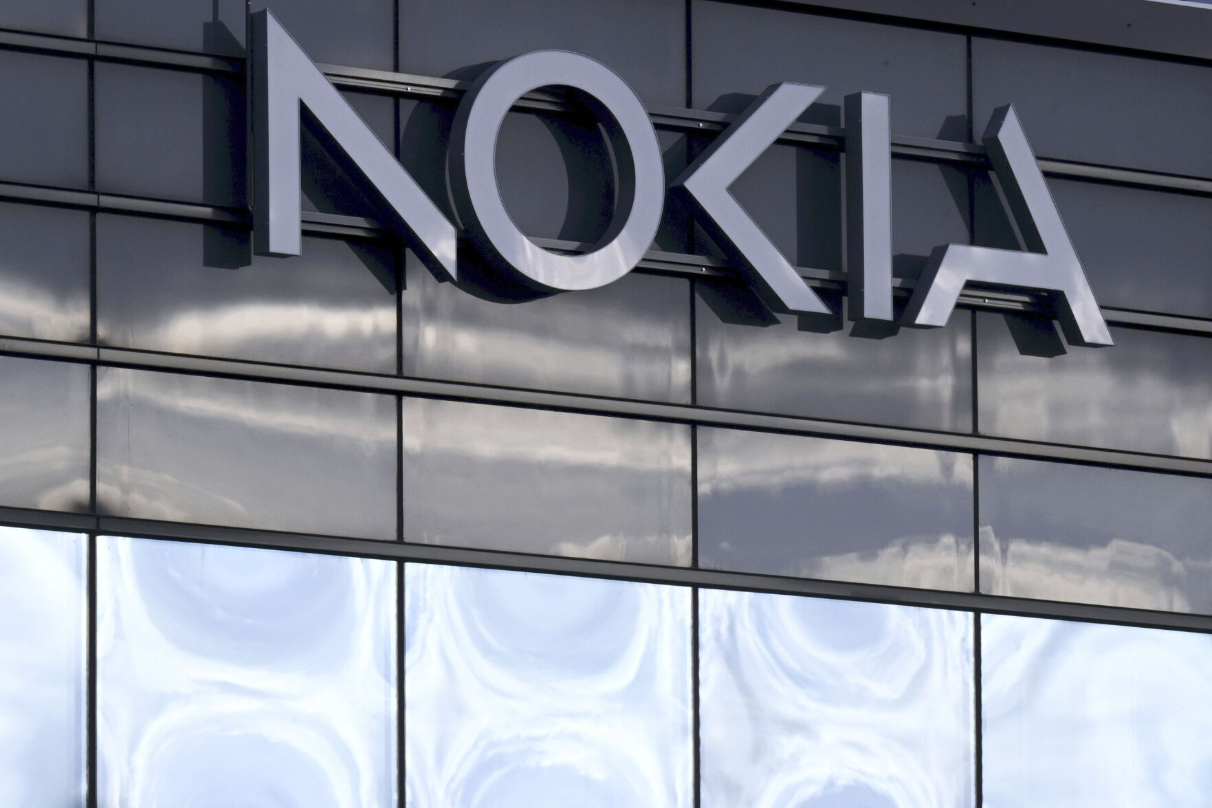 <p>A view of the Nokia headquarters in Espoo, Finland, Thursday, Oct. 19, 2023. Telecom gear maker Nokia said Thursday that it is planning to cut up to 14,000 jobs worldwide, or 16% of its workforce, as part of a push to reduce costs following a plunge in third-quarter sales and profit. The Finnish wireless and fixed-network equipment provider said the planned measures are aimed at reducing its cost base and increase operational efficiency “to navigate the current market uncertainty." (Jussi Nukari/Lehtikuva via AP)</p>   PHOTO CREDIT: Jussi Nukari