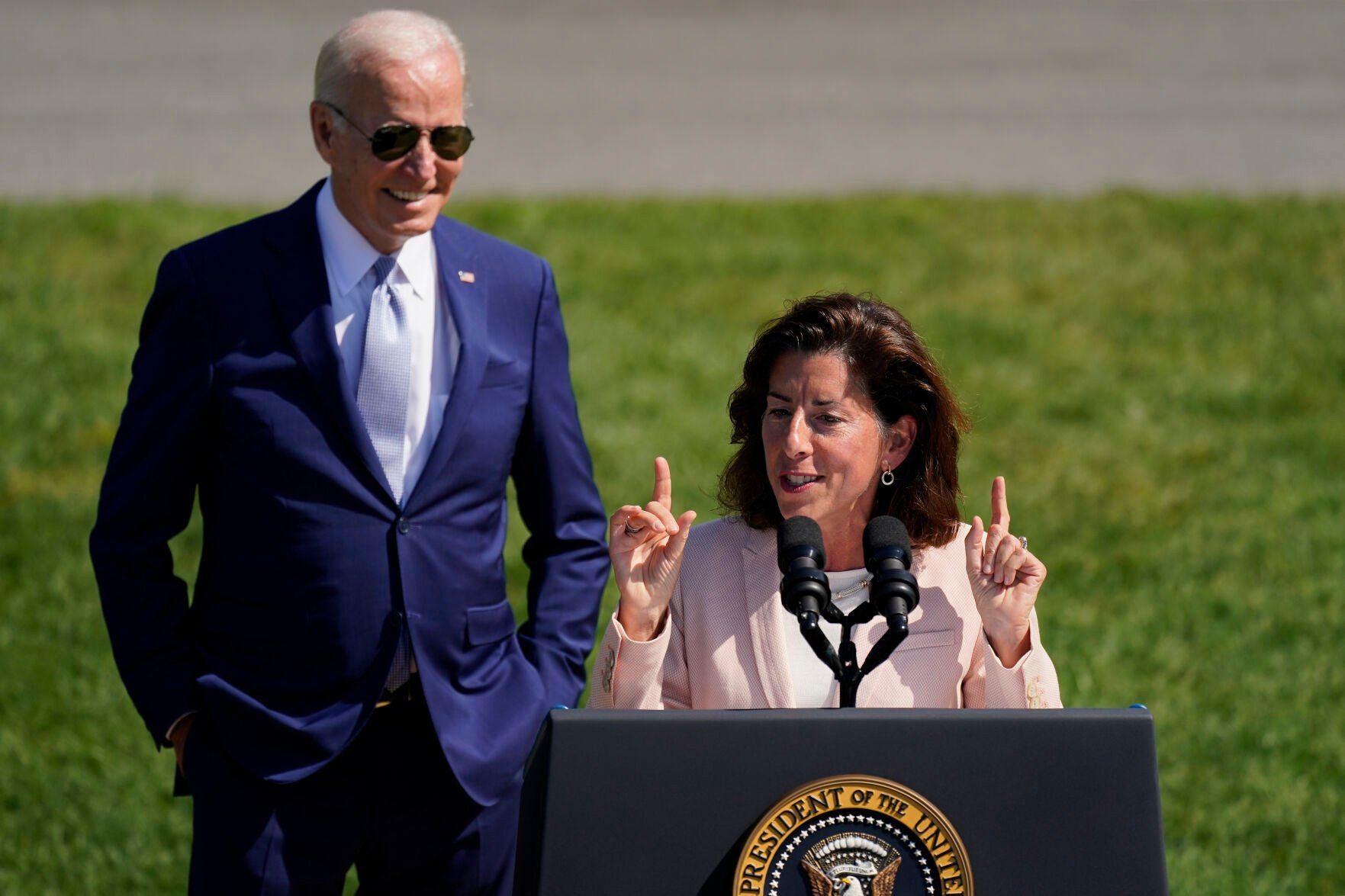 <p>FILE - President Joe Biden looks on as Commerce Secretary Gina Raimondo speaks on the South Lawn of the White House, Aug. 9, 2022, in Washington. The Biden administration is designating 31 “tech hubs” in 32 states and Puerto Rico to help spur innovation and create jobs in the specific industries that are concentrated in these areas. “I have to say, in my entire career in public service, I have never seen as much interest in any initiative than this one," Raimondo told reporters during a Sunday, Oct. 22, 2023, conference call to preview the announcement. (AP Photo/Carolyn Kaster, File)</p>   PHOTO CREDIT: Carolyn Kaster 