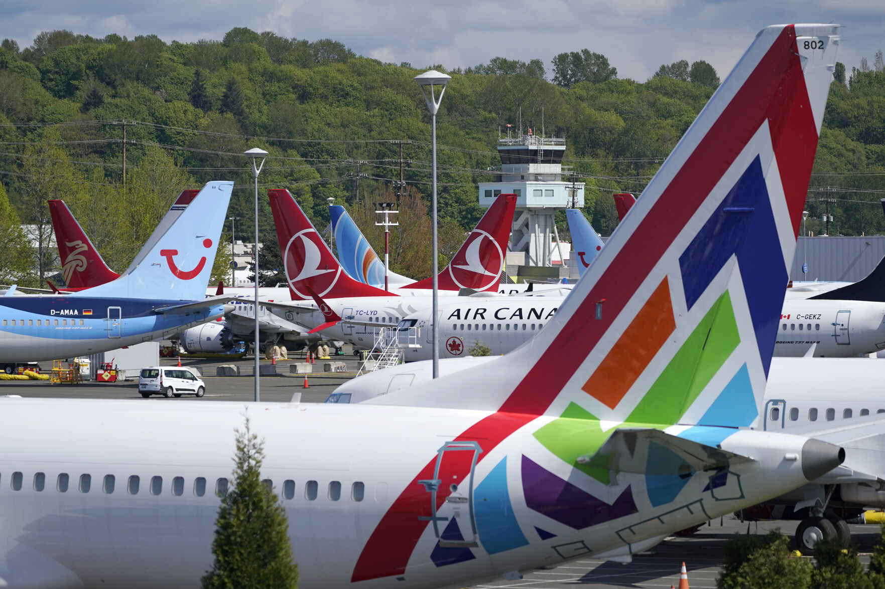<p>FILE - Boeing 737 Max airplanes sit parked in a storage lot, Monday, April 26, 2021, near Boeing Field in Seattle. Boeing reports earnings on Wednesday, Oct. 25, 2023. (AP Photo/Ted S. Warren)</p>   PHOTO CREDIT: Ted S. Warren 