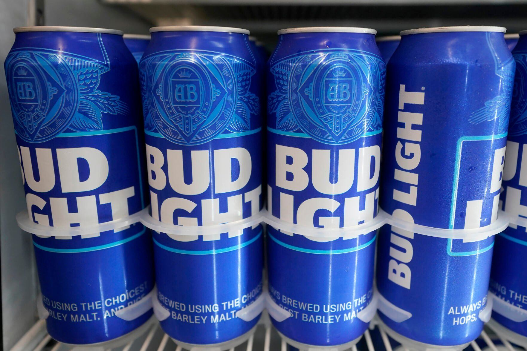 <p>FILE-Cans of Bud Light chill in a refrigerator in Oakland, Calif., Friday, April 28, 2023. AB InBev reports earnings on Tuesday, Oct. 31. (AP Photo/Jeff Chiu)</p>   PHOTO CREDIT: Jeff Chiu 