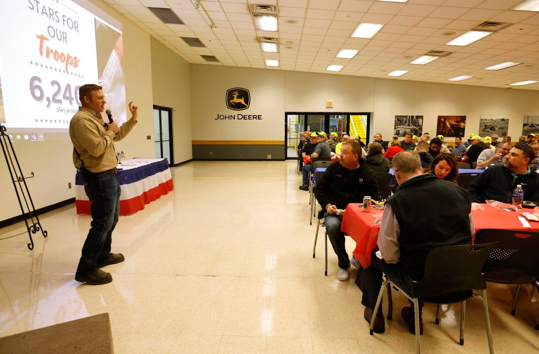 Alec Zwanziger, with John Deere Dubuque Works, speaks during a Veterans Day luncheon recognizing employee veterans at the facility in Dubuque on Thursday, Nov. 9, 2023.    PHOTO CREDIT: JESSICA REILLY