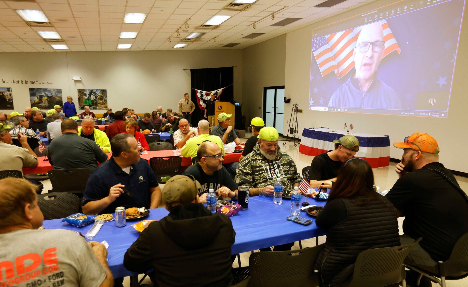 Mark Dickson, general manager of John Deere Dubuque Works, speaks virtually during a Veterans Day luncheon recognizing employee veterans at the facility in Dubuque on Thursday, Nov. 9, 2023.    PHOTO CREDIT: JESSICA REILLY
