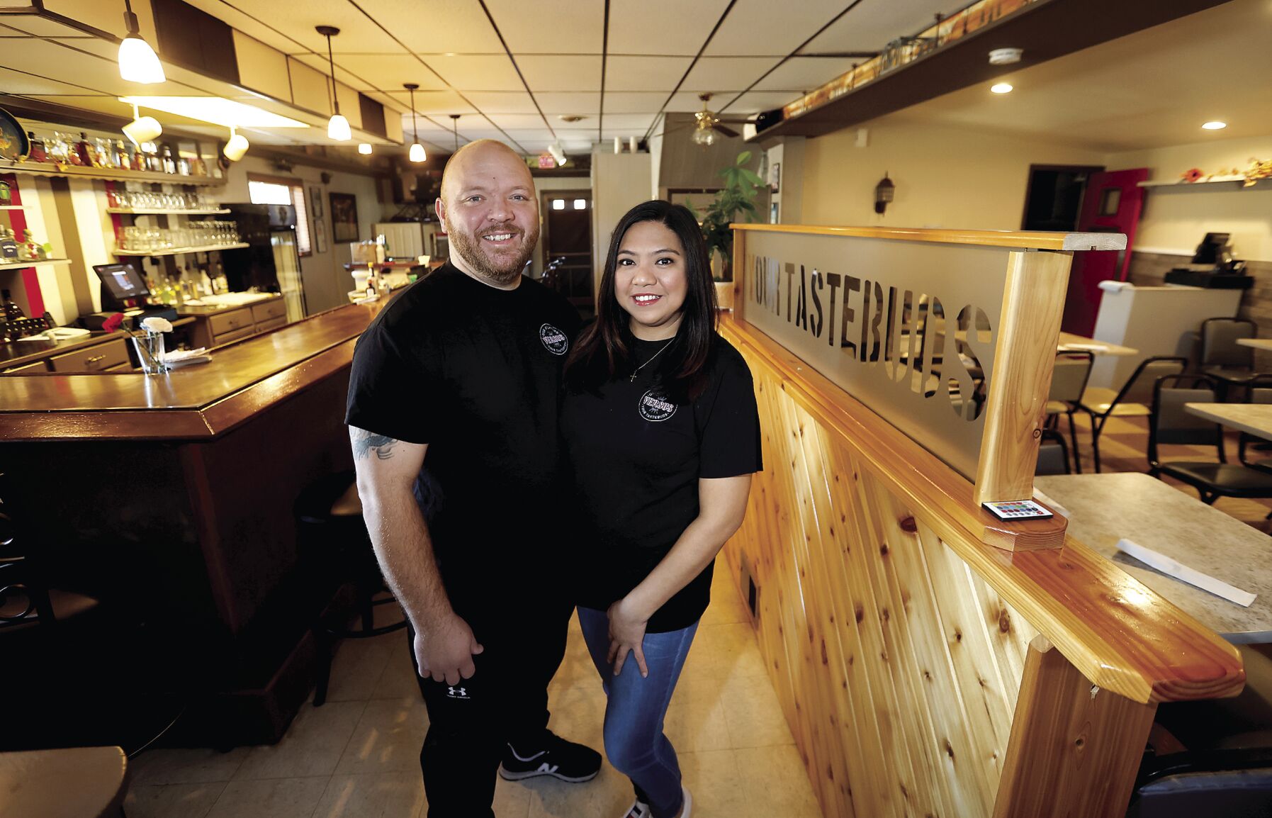 Owners Lucas and Liberty Miller stand at Versus 2.0 Authentic Asian Kitchen/Bar in Dubuque.    PHOTO CREDIT: JESSICA REILLY
