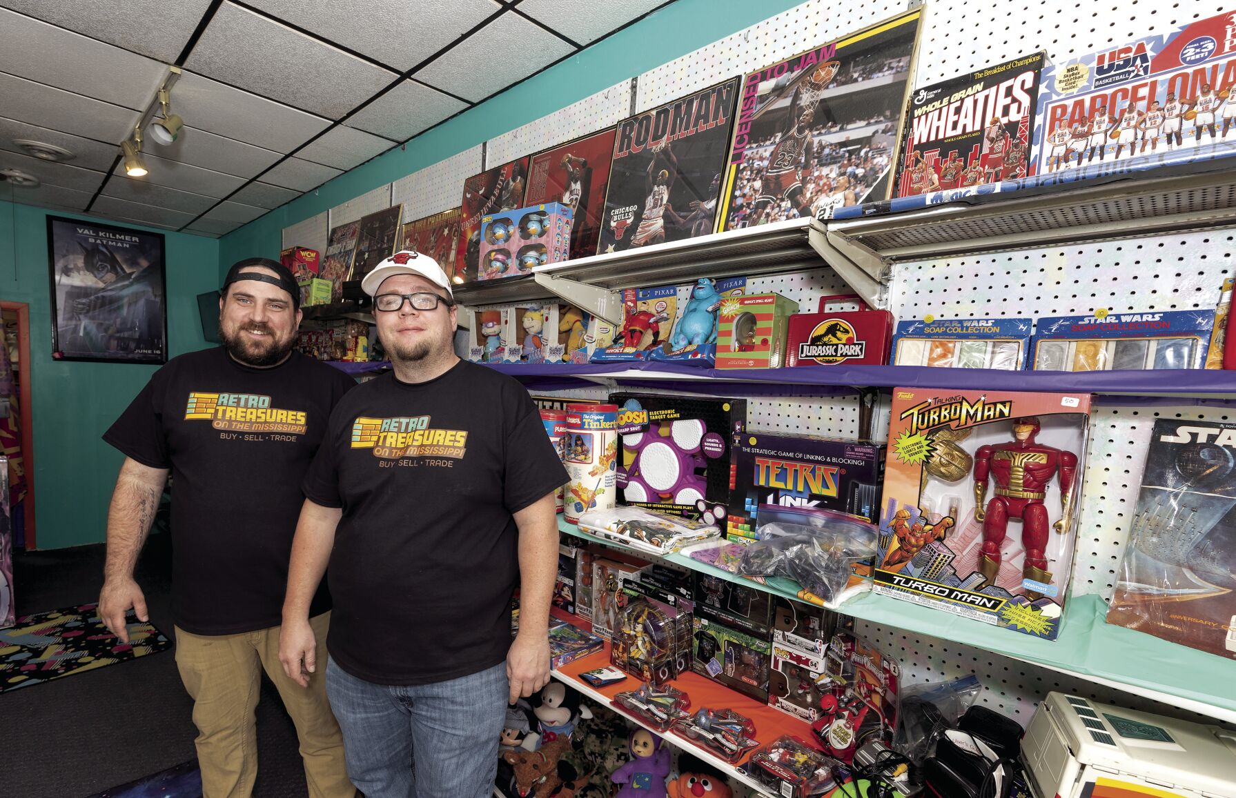 Co-owners Justin Rainey (left) and Benjamin Cartwright stand inside Retro Treasures on the Mississippi, which is located at 1520 Central Ave., in Dubuque.    PHOTO CREDIT: Stephen Gassman