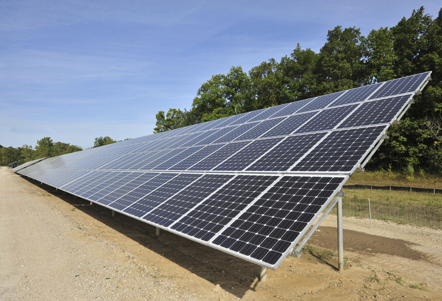 <p>FILE - One of more than 4,000 solar panels constructed by DTE Energy lines a 9.37-acre swath of land in Ann Arbor Township, Mich., Sept. 15, 2015. Michigan will join four other states in requiring utility providers to transition to 100% carbon-free energy generation by 2040 under legislation that will soon be signed by Gov. Gretchen Whitmer. (Ryan Stanton/Ann Arbor News via AP, File)</p>   PHOTO CREDIT: Ryan Stanton 