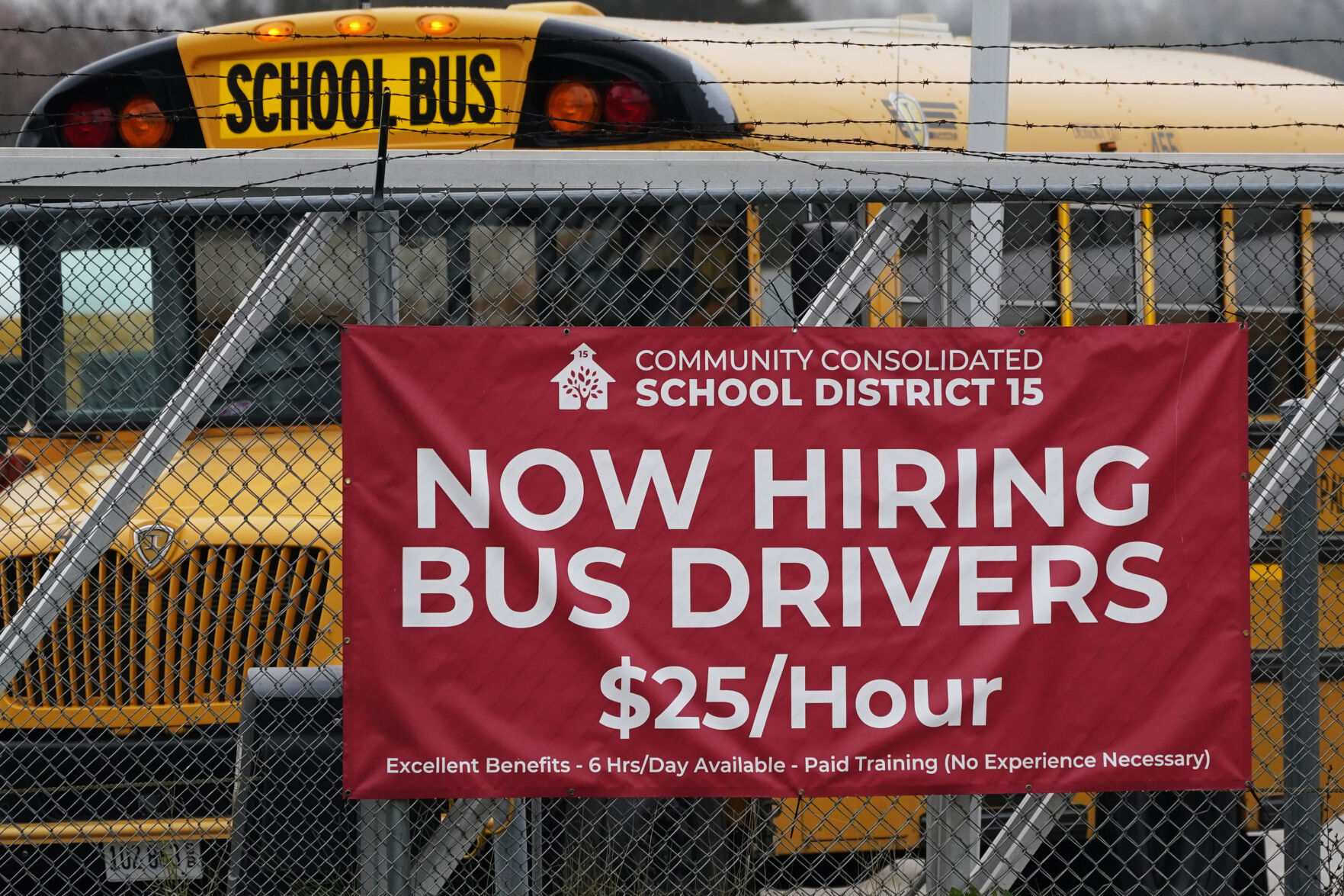 <p>A hiring sign is displayed at a school in Palatine, Ill., Wednesday, Nov. 8, 2023. On Thursday, the Labor Department reports on the number of people who applied for unemployment benefits last week. (AP Photo/Nam Y. Huh)</p>   PHOTO CREDIT: Nam Y. Huh 
