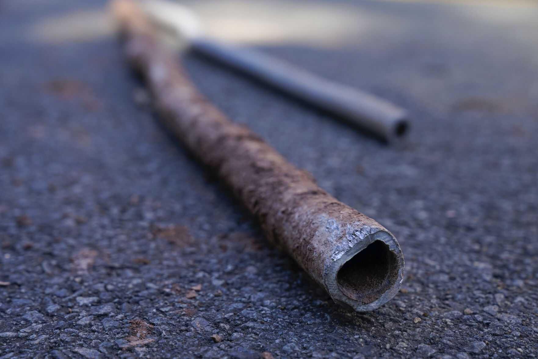 <p>FILE - Lead water pipes pulled from underneath the street are seen in Newark, N.J., Oct. 21, 2021. (AP Photo/Seth Wenig, File)</p>   PHOTO CREDIT: Seth Wenig 