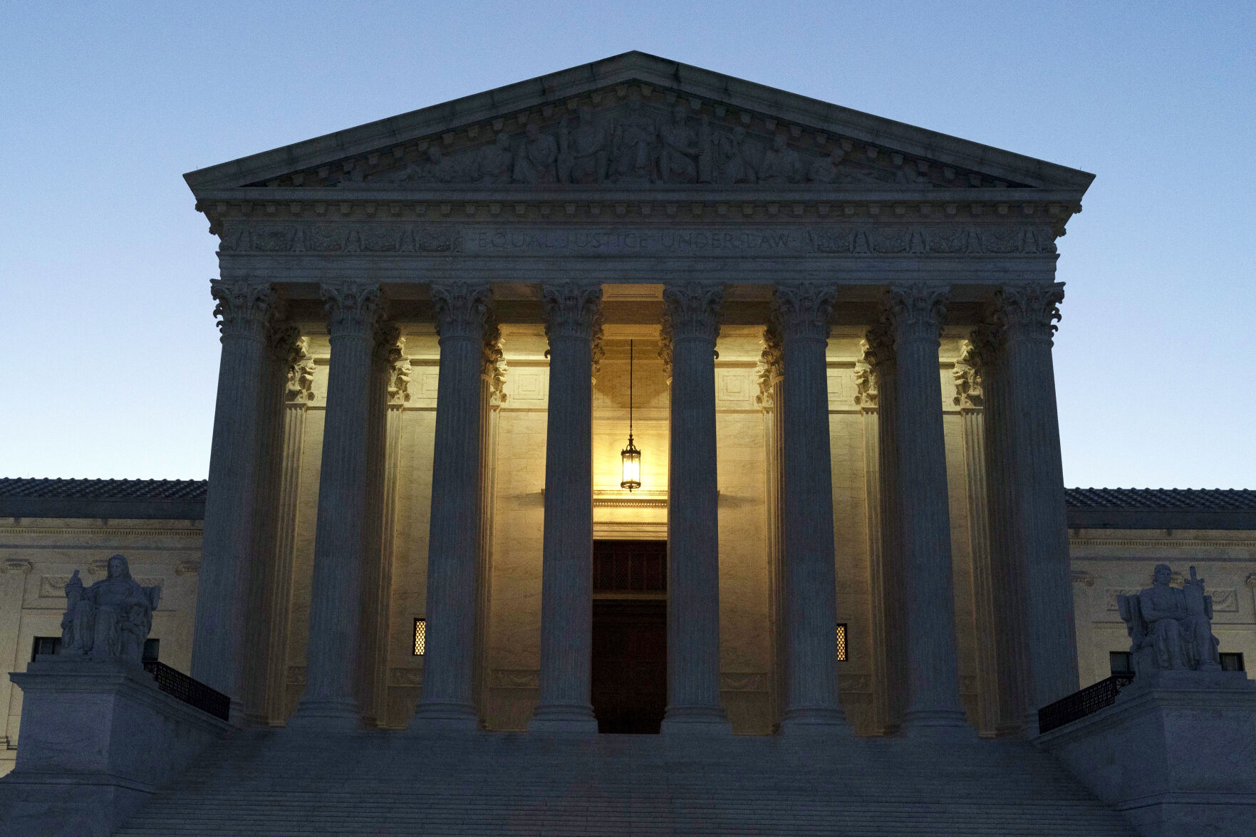 <p>FILE - The U.S. Supreme Court is seen before sunrise on Capitol Hill in Washington, March. 21, 2022. On Dec. 4, 2023, the Supreme Court will hear arguments over a nationwide settlement with OxyContin maker Purdue Pharma that would shield members of the Sackler family who own the company from civil lawsuits over the toll of opioids.(AP Photo/Jose Luis Magana, File)</p>   PHOTO CREDIT: Jose Luis Magana 