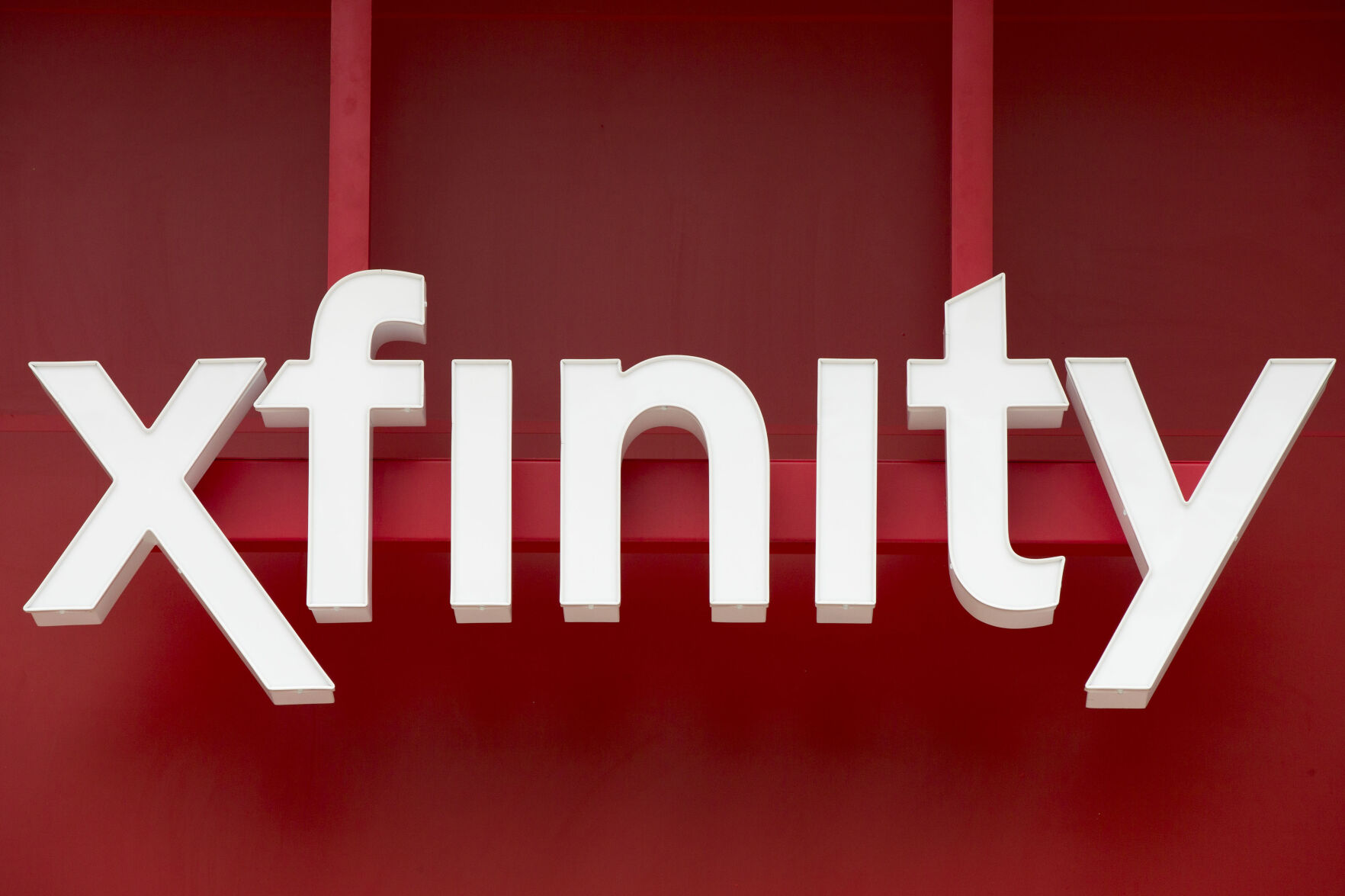 <p>FILE - Signage for Xfinity, the cable division of Comcast, is displayed in Philadelphia, July 15, 2015. Hackers accessed Xfinity customers’ personal information by exploiting a vulnerability in software used by the company, the Comcast-owned telecommunications business announced this week. In a Monday, Dec. 18, 2023, notice to customers, Xfinity said there was unauthorized access to internal systems as a result of this vulnerability — which was previously announced by software provider Citrix — between Oct. 16 and 19. (AP Photo/Matt Rourke, File)</p>   PHOTO CREDIT: Matt Rourke